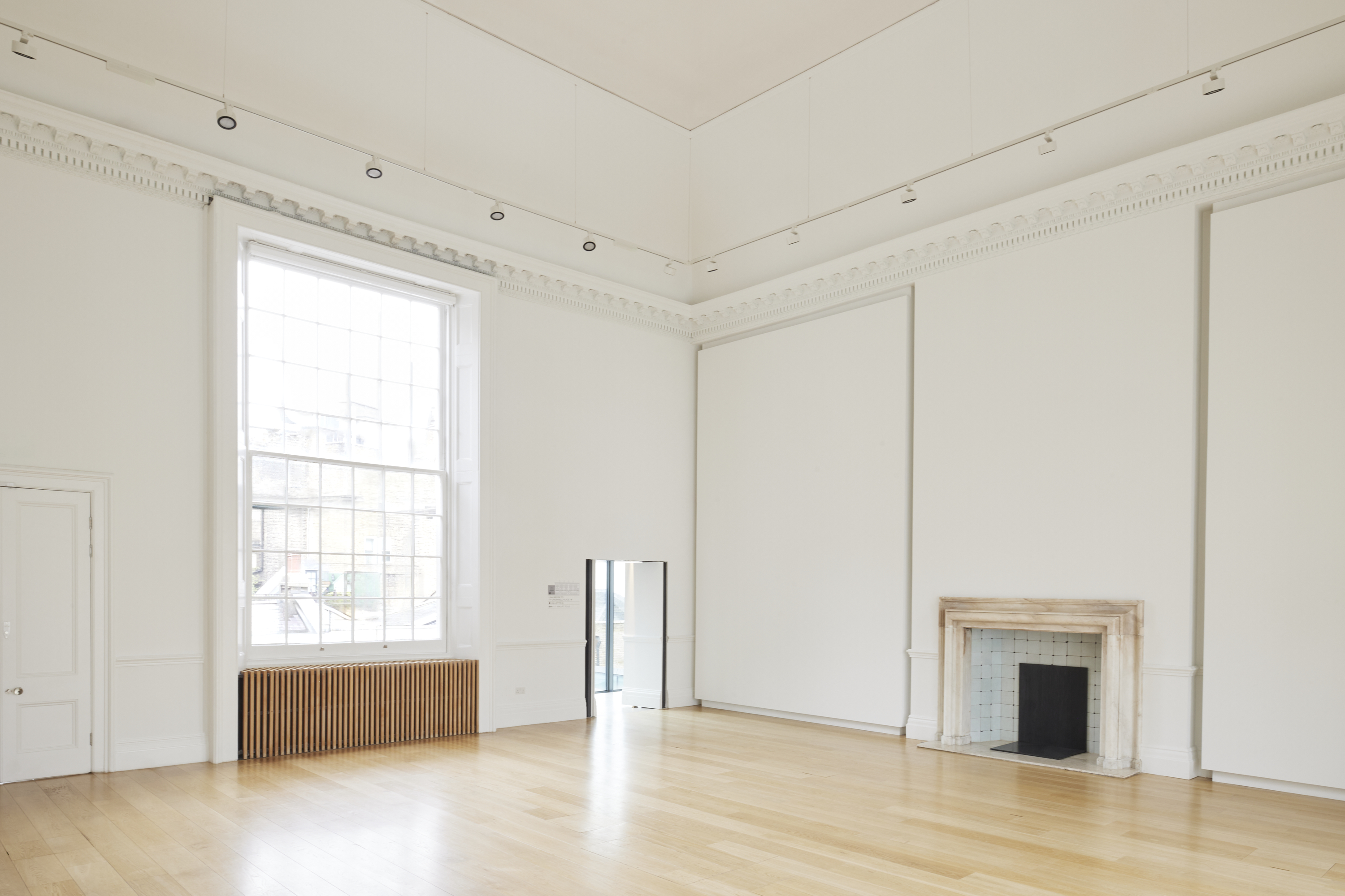 Spacious Lavery Studio event space with high ceilings and natural light for gatherings.