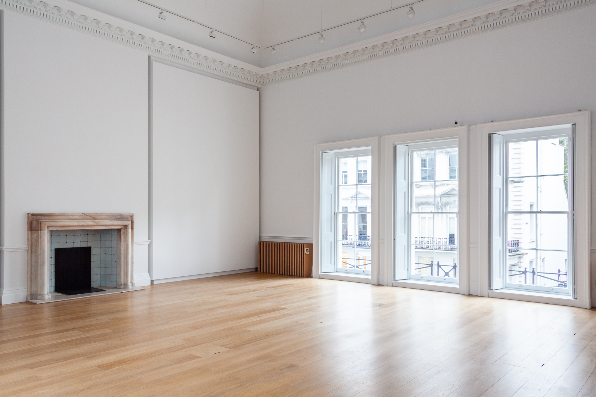 Spacious Lavery Studio event space with large windows, ideal for workshops and receptions.