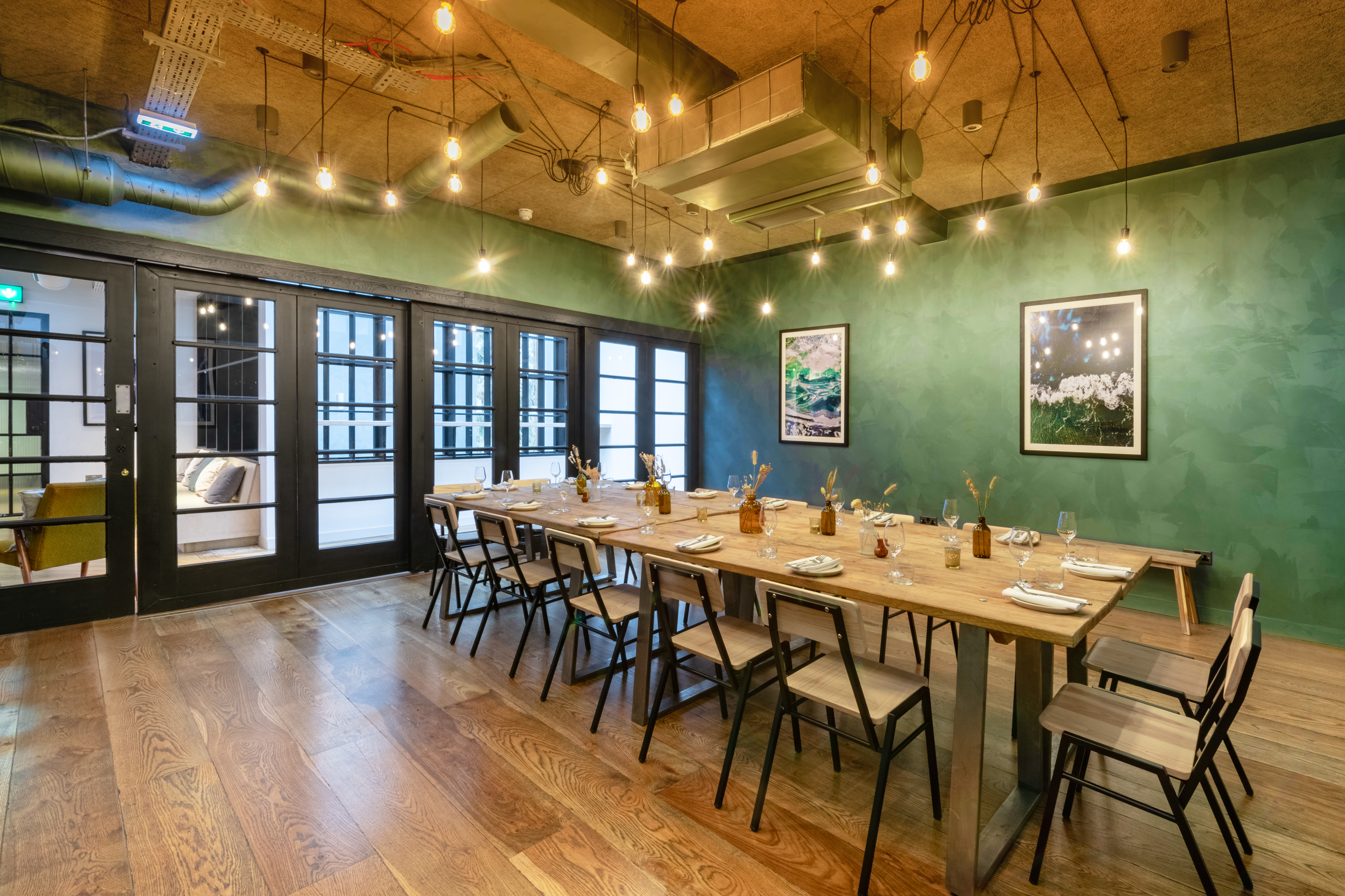 Stylish Green Room in Carousel London, ideal for corporate retreats and private events.