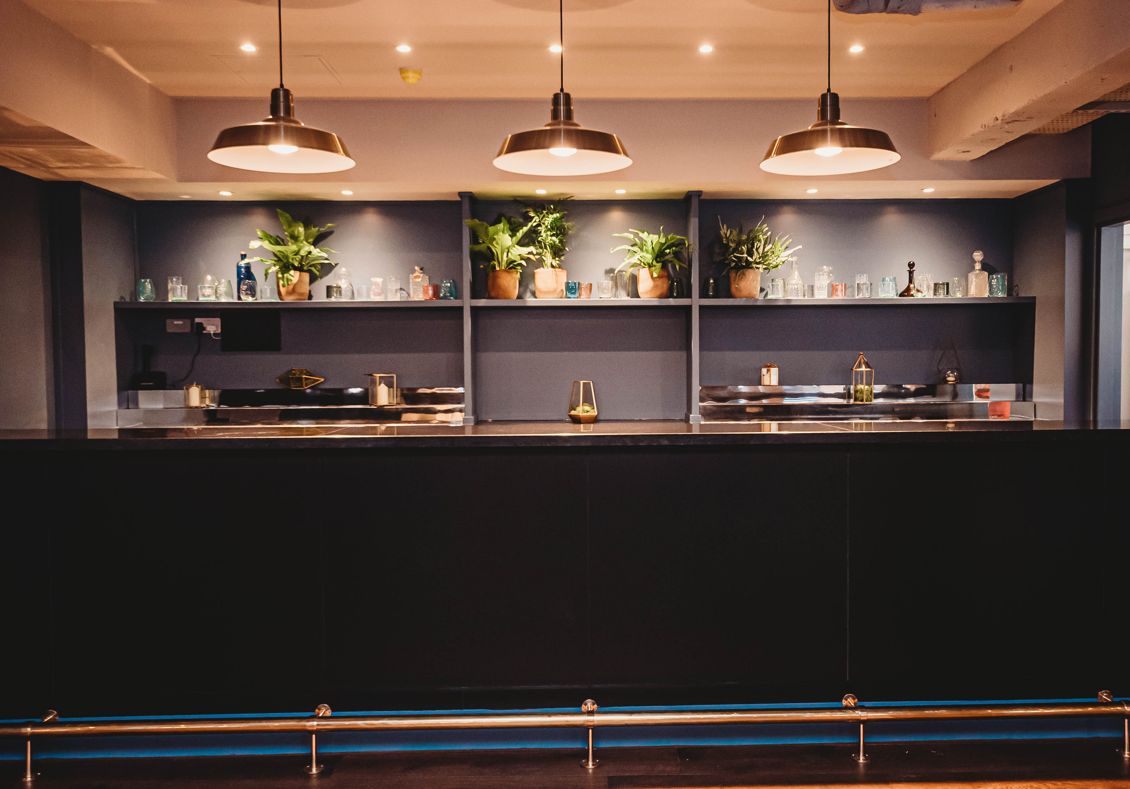 Event space at The Storehouse in Whitworth Locke with sleek bar and modern ambiance.