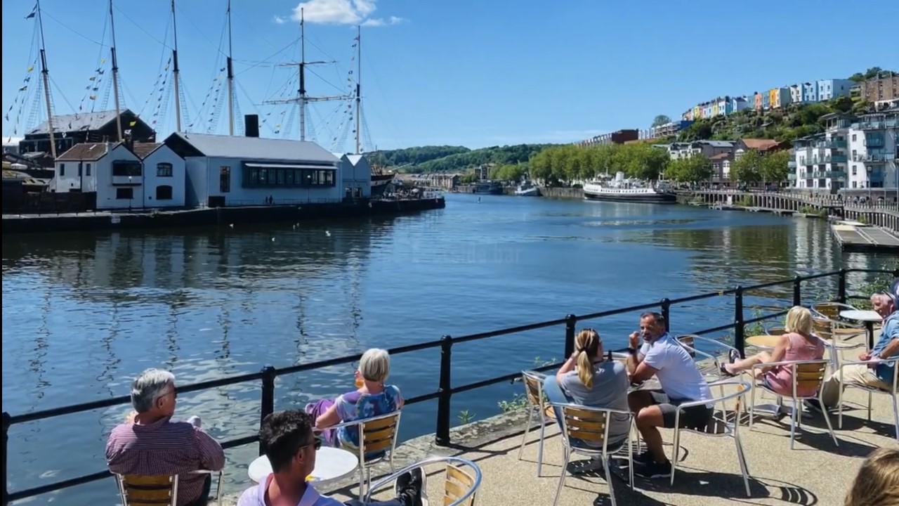 Private dining room at BROWN & BYE with waterfront views, ideal for summer events.