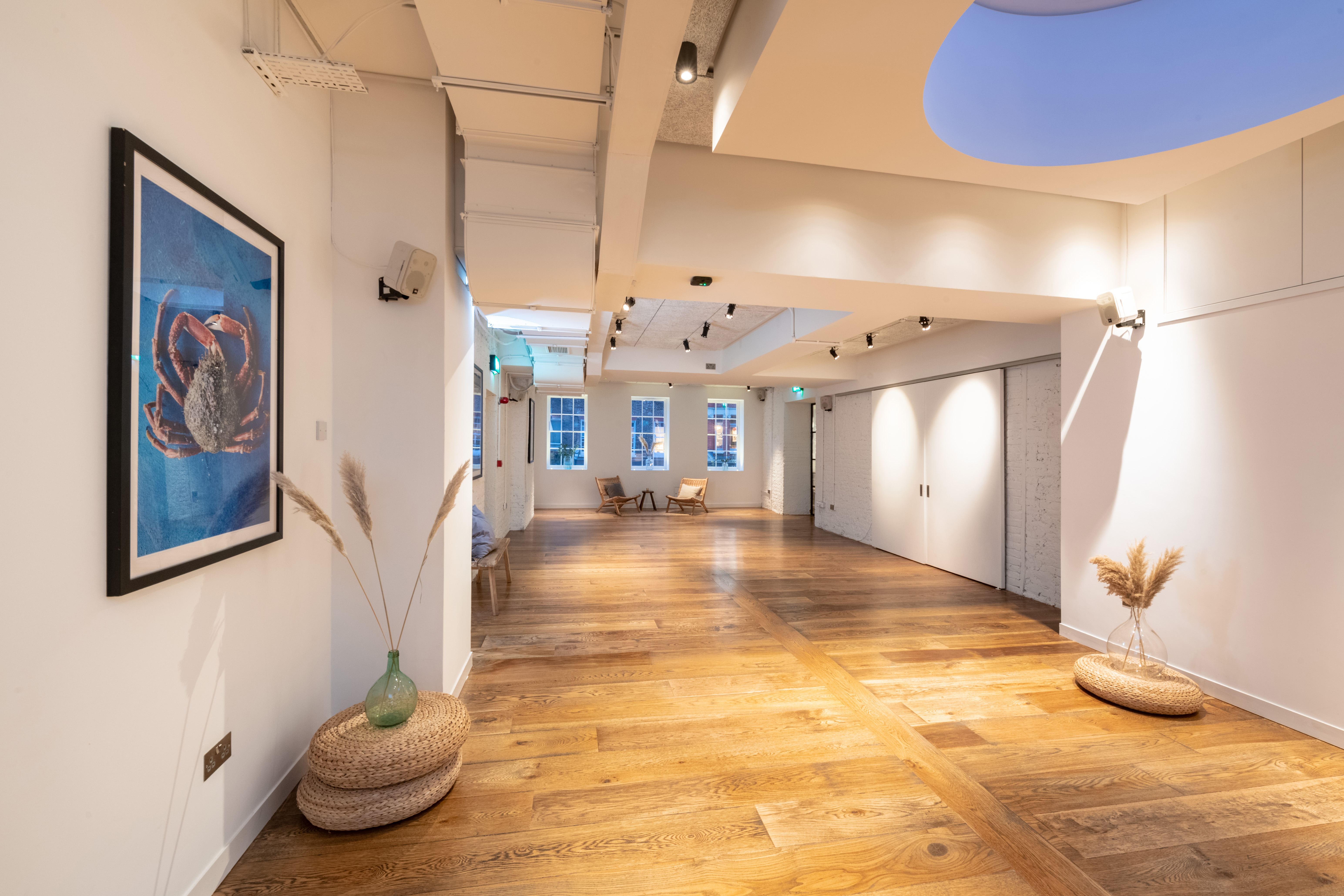 White Room in Carousel London, spacious venue with polished floors for meetings and workshops.