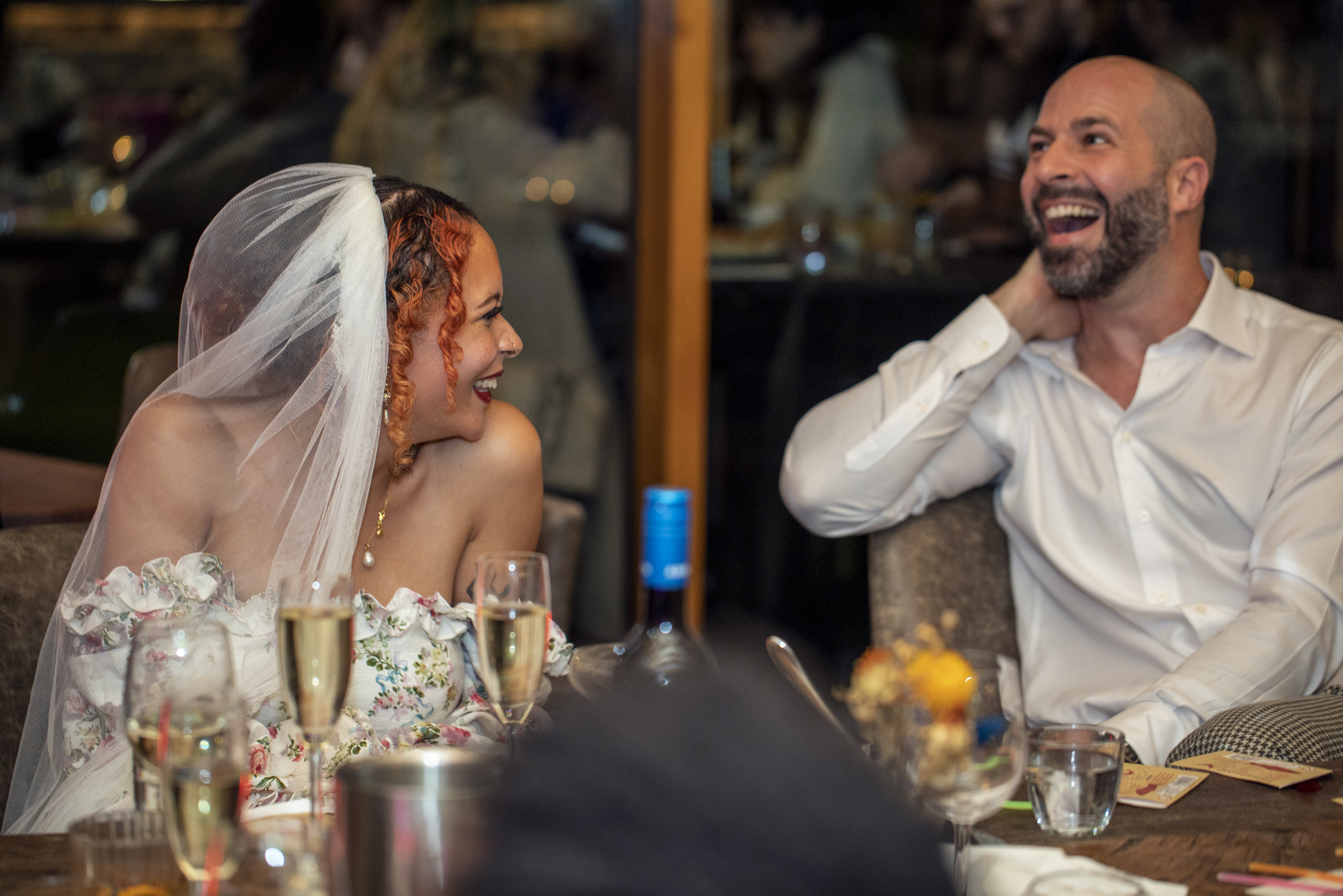 Joyful wedding reception in The Greenroom, showcasing couple's emotional connection and celebration.