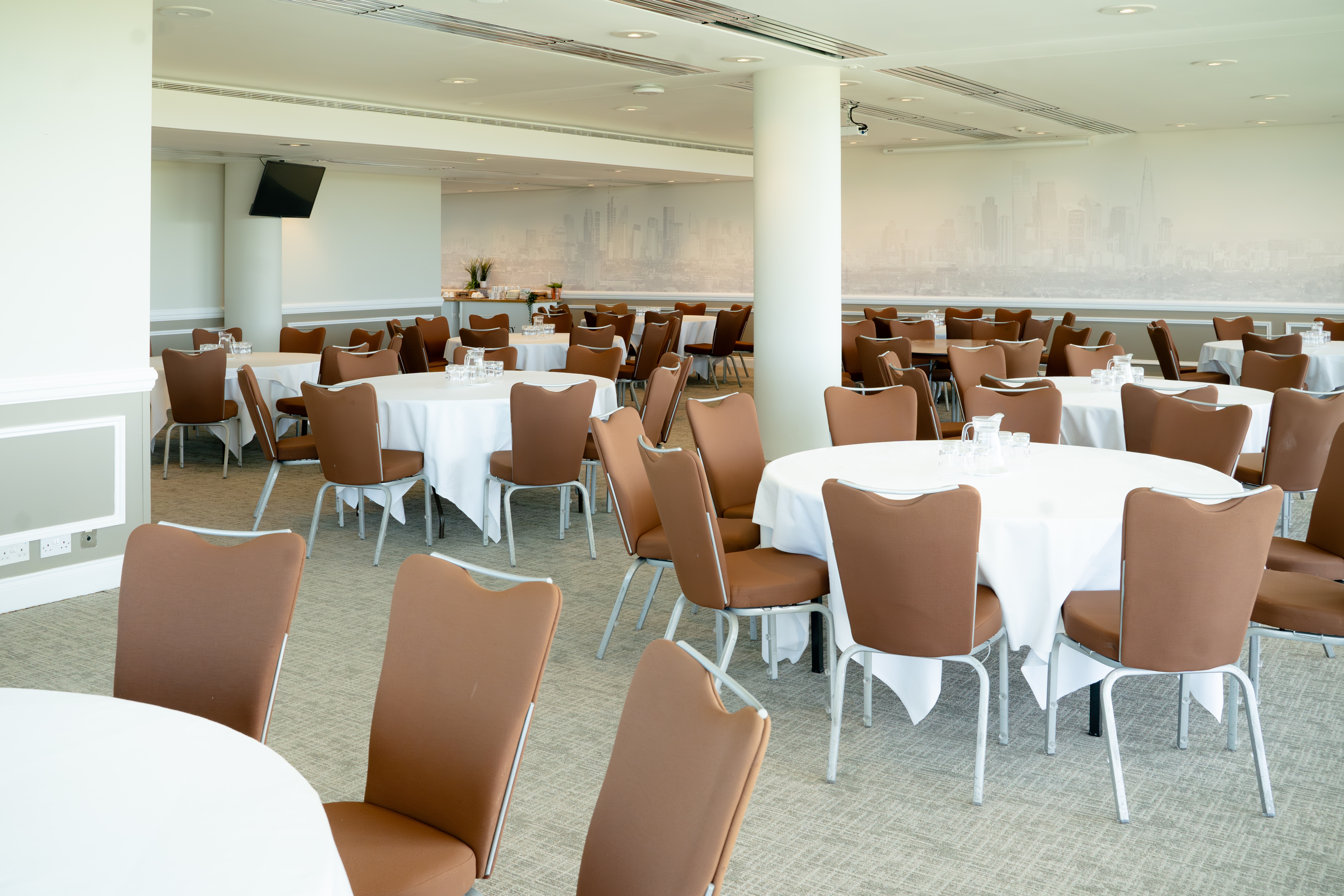 Spacious Jockey Club Room at Epsom Downs, ideal for corporate events and banquets.