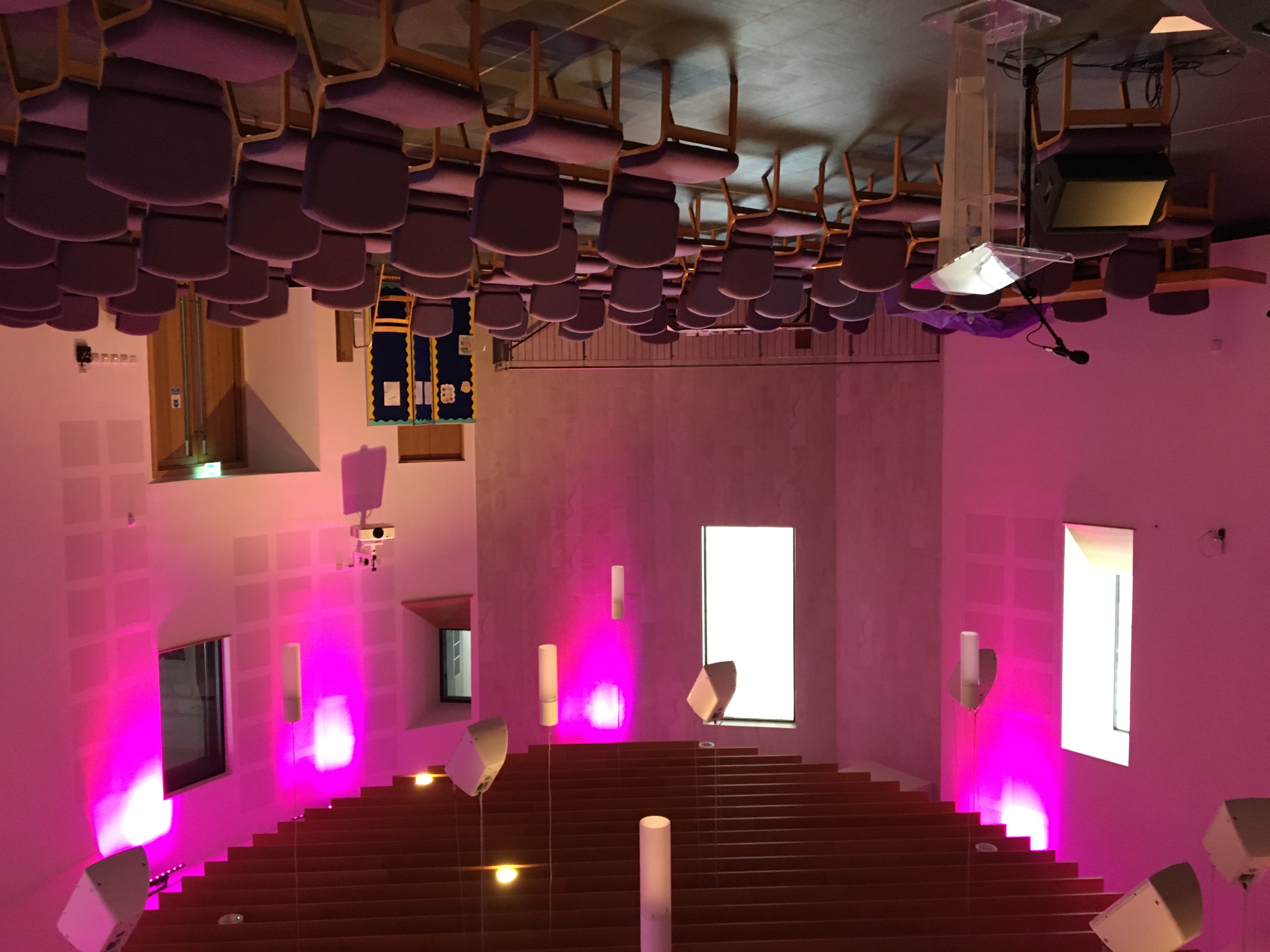 Performance Hall in Tab Centre with flexible seating and purple accents for events.