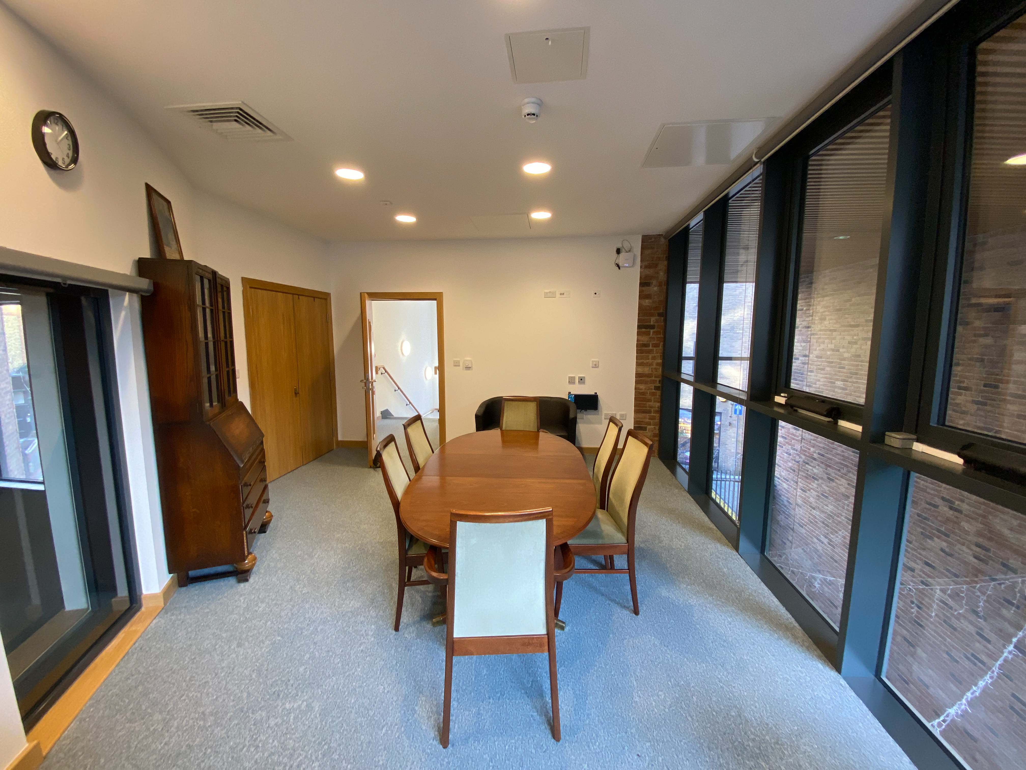 Performance Hall in Tab Centre: bright meeting room with round table for events and gatherings.