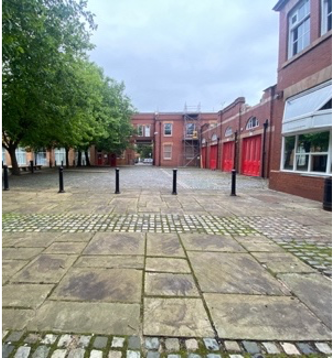 Albert Bentley Place: cobbled outdoor venue for social and corporate events with greenery.