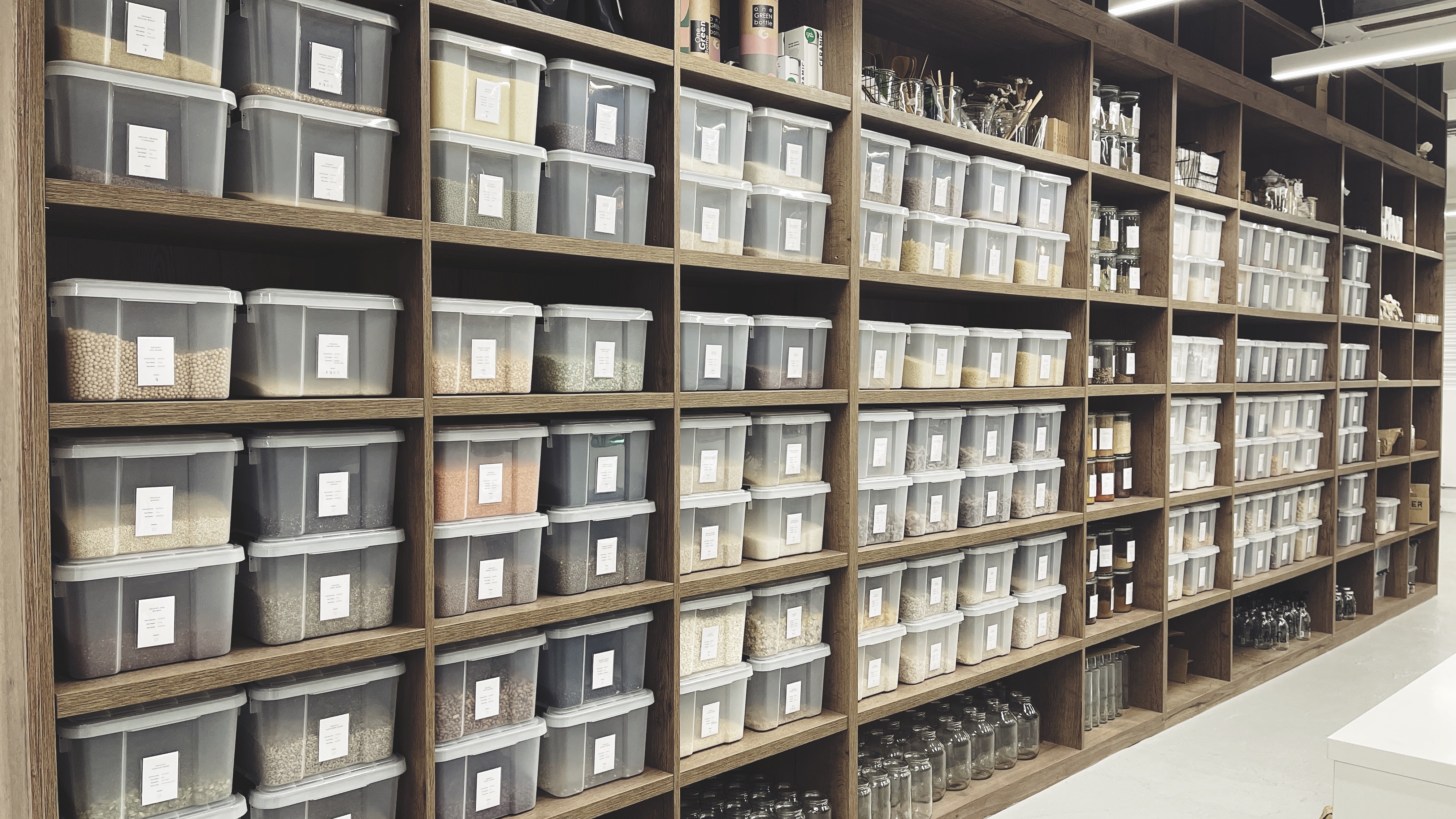 Well-organized storage area with labeled bins for efficient event supply management.