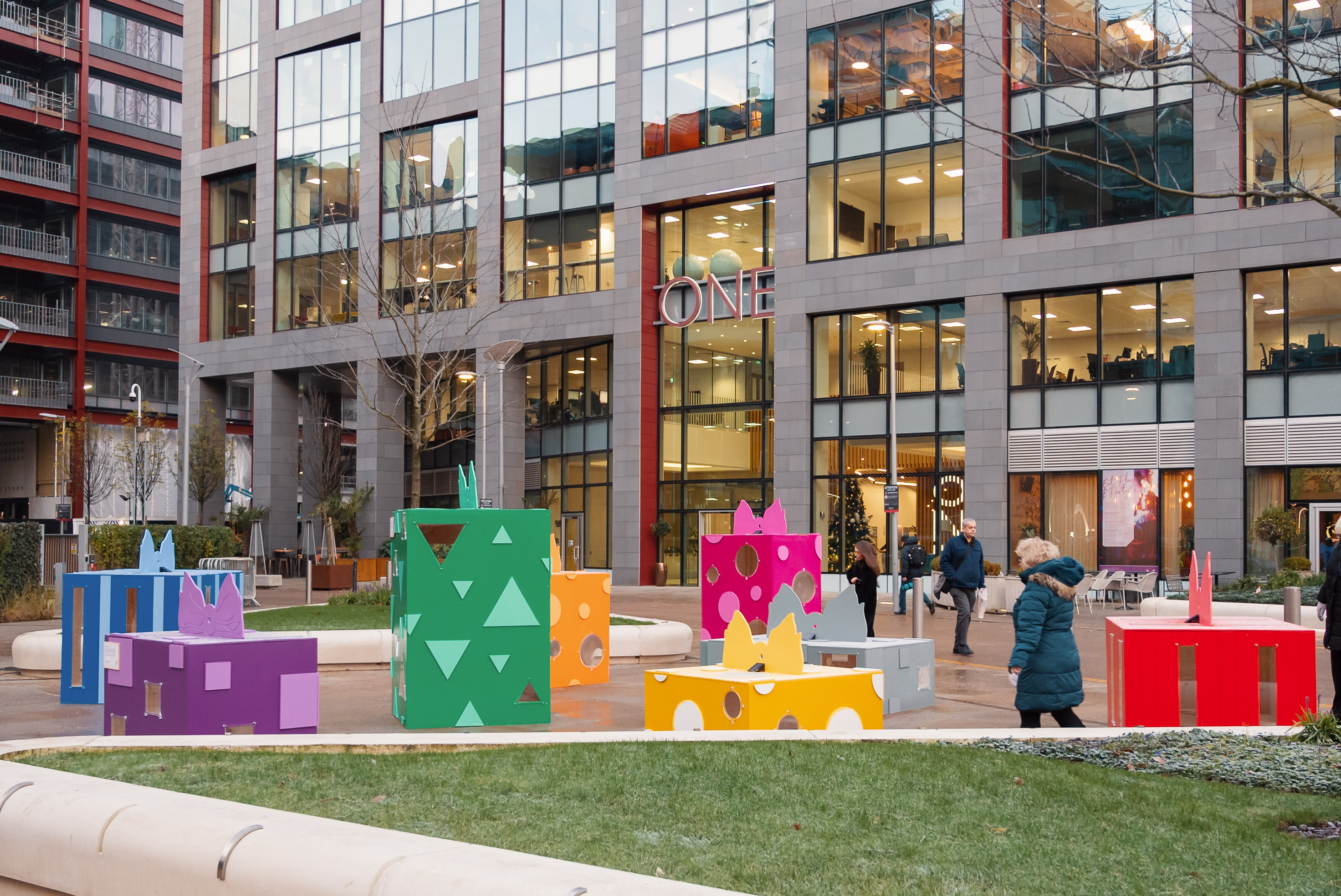 Vibrant outdoor venue in Stanley Square with colorful installations for networking events.