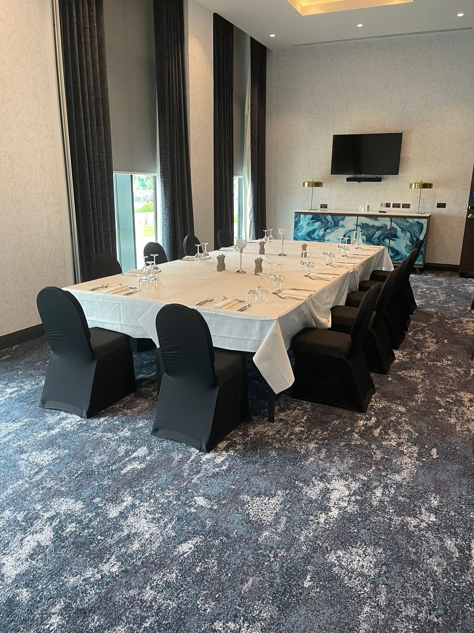 Stoneywood Suite meeting room with elegant decor, ideal for corporate events and gatherings.