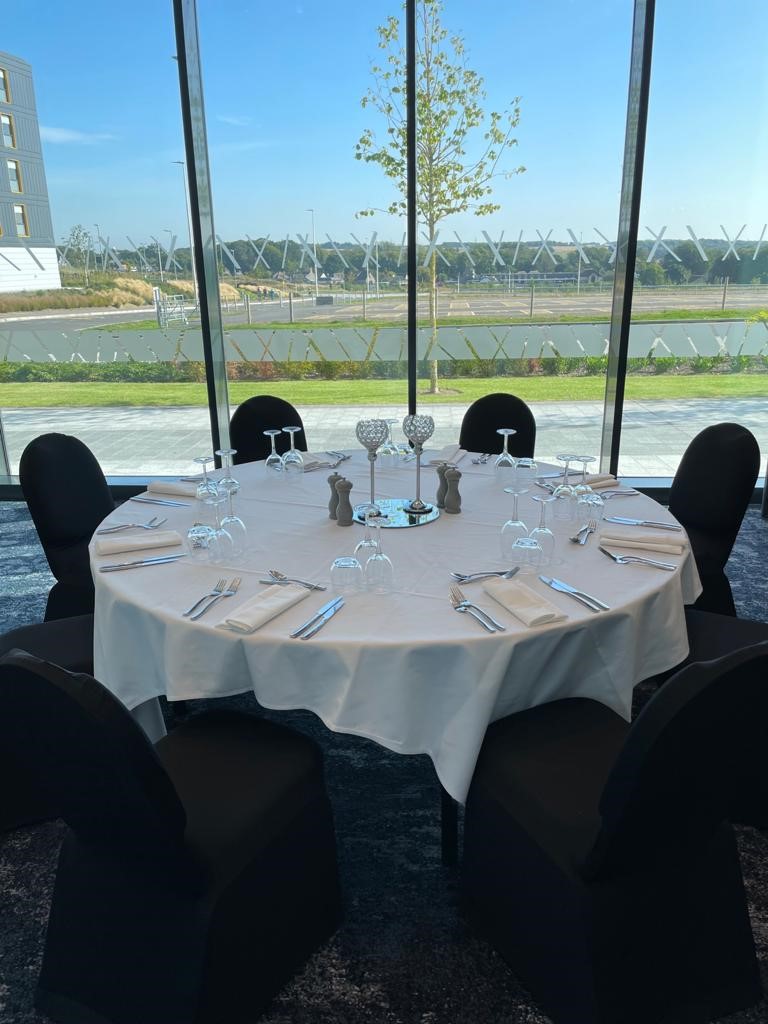 Kirkhill Suite round table setup for elegant events at Hilton Aberdeen TECA.