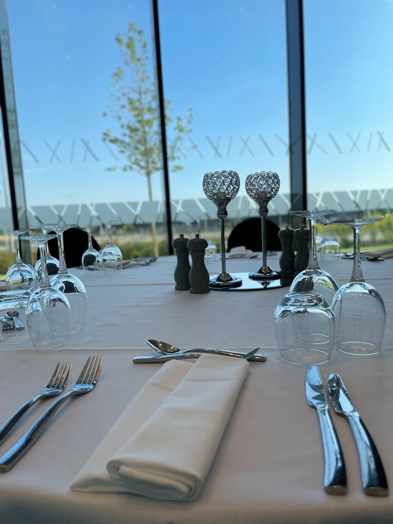 Elegant dining setup in Kirkhill Suite, Hilton Aberdeen TECA for corporate events and celebrations.