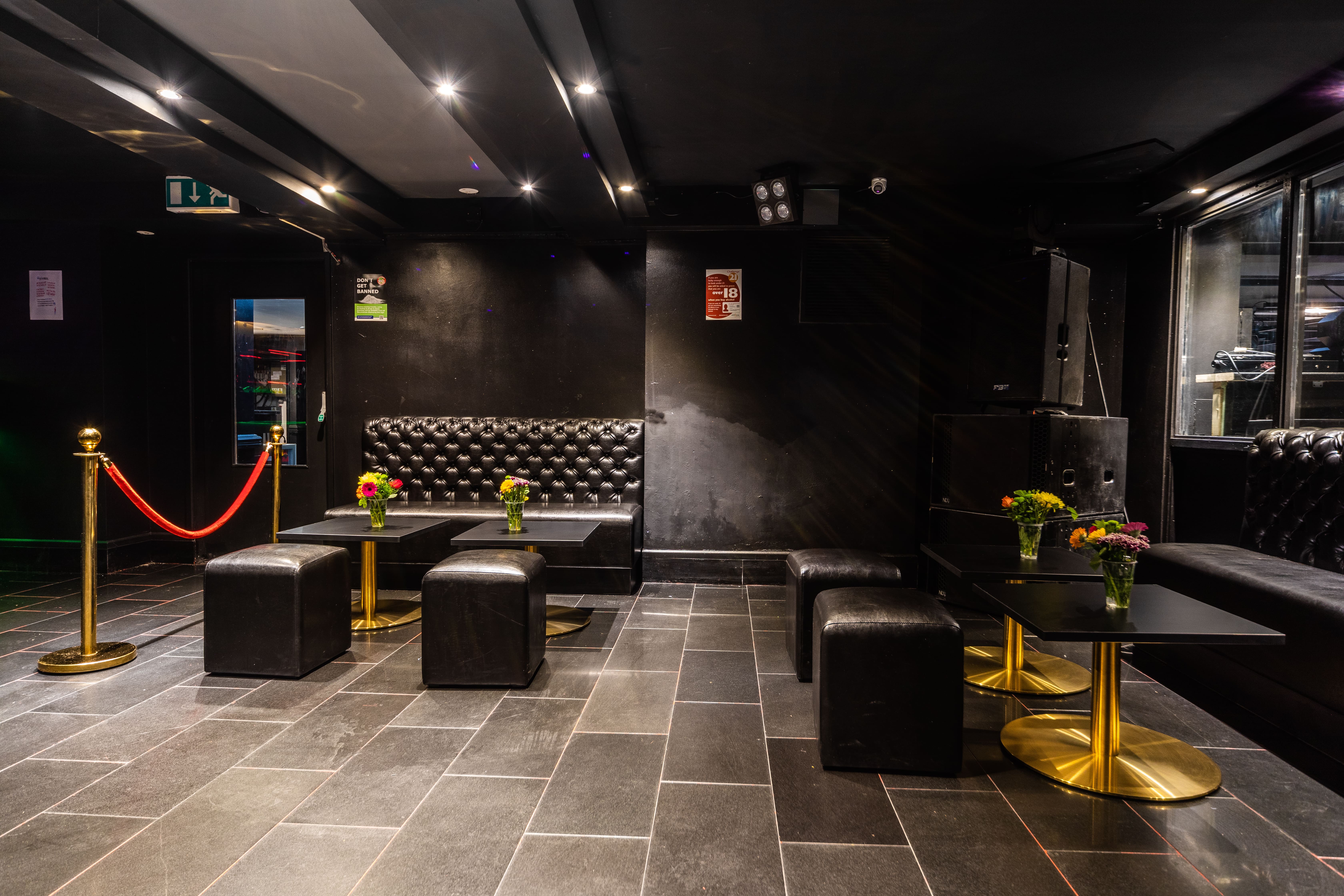 Modern event space with plush seating, ideal for networking and gatherings in Tunbridge Wells.