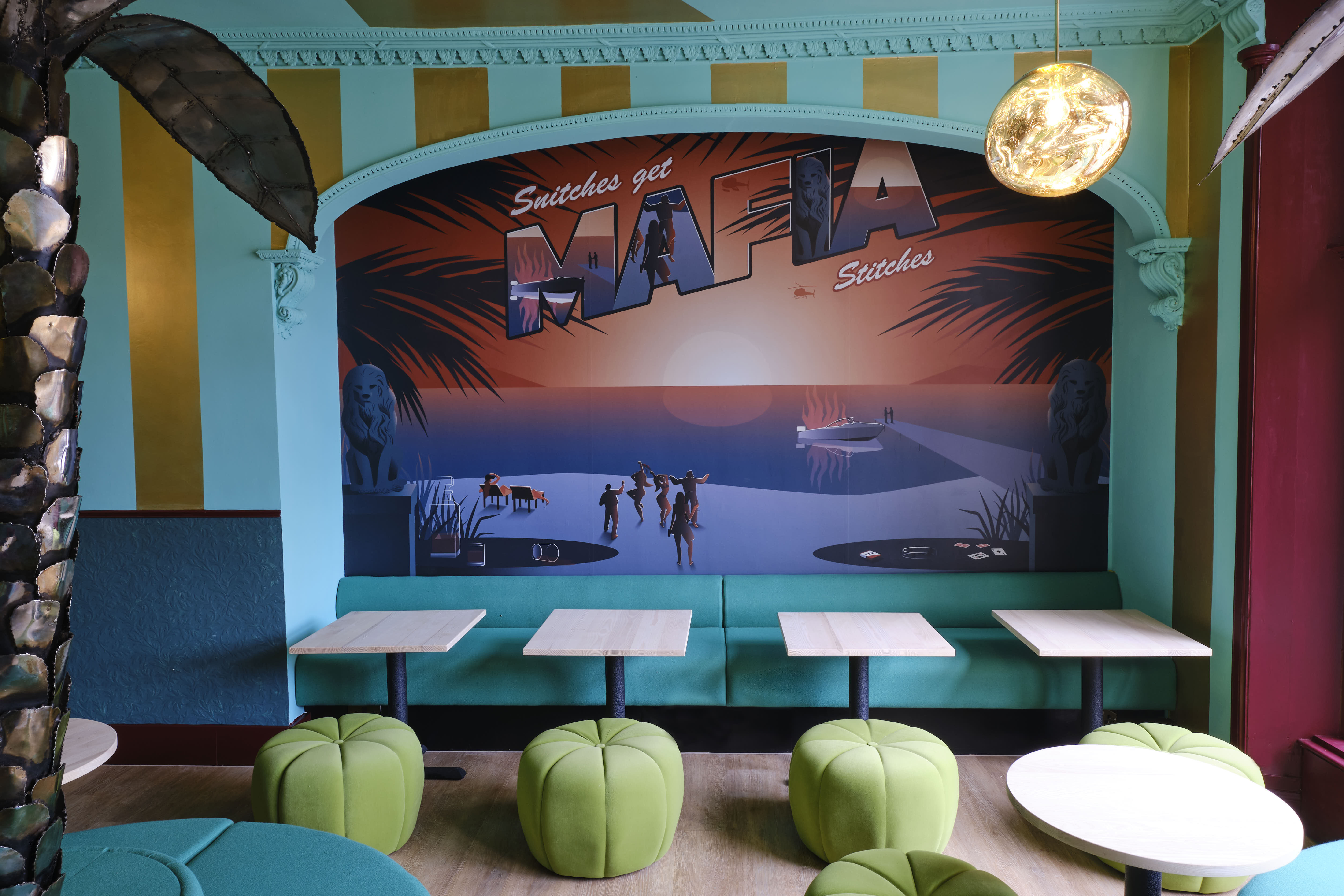 Vibrant Miami Bay meeting space with bold mural for creative events and gatherings.