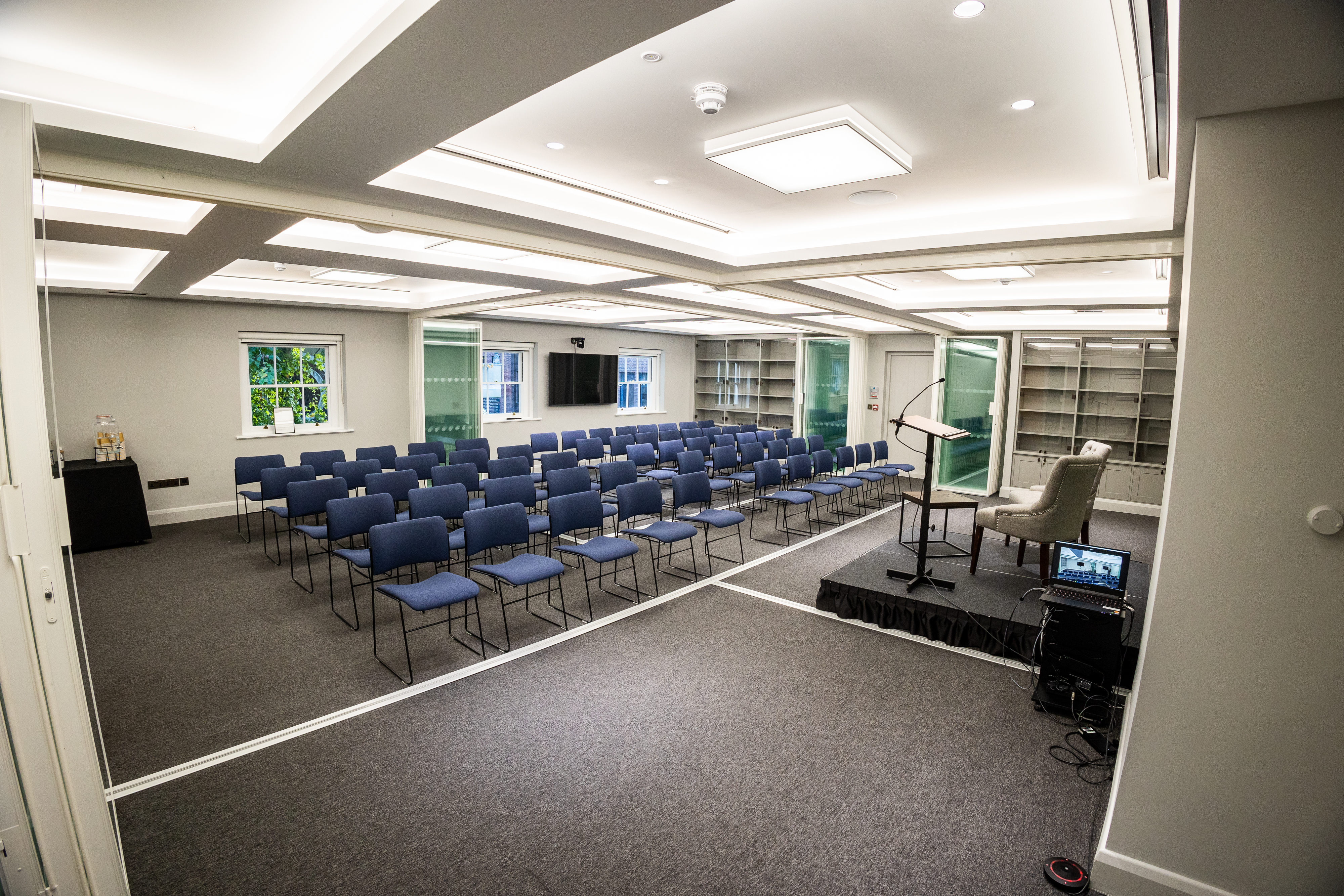 Third Floor Meeting space at Stationers' Hall with blue chairs for workshops and presentations.