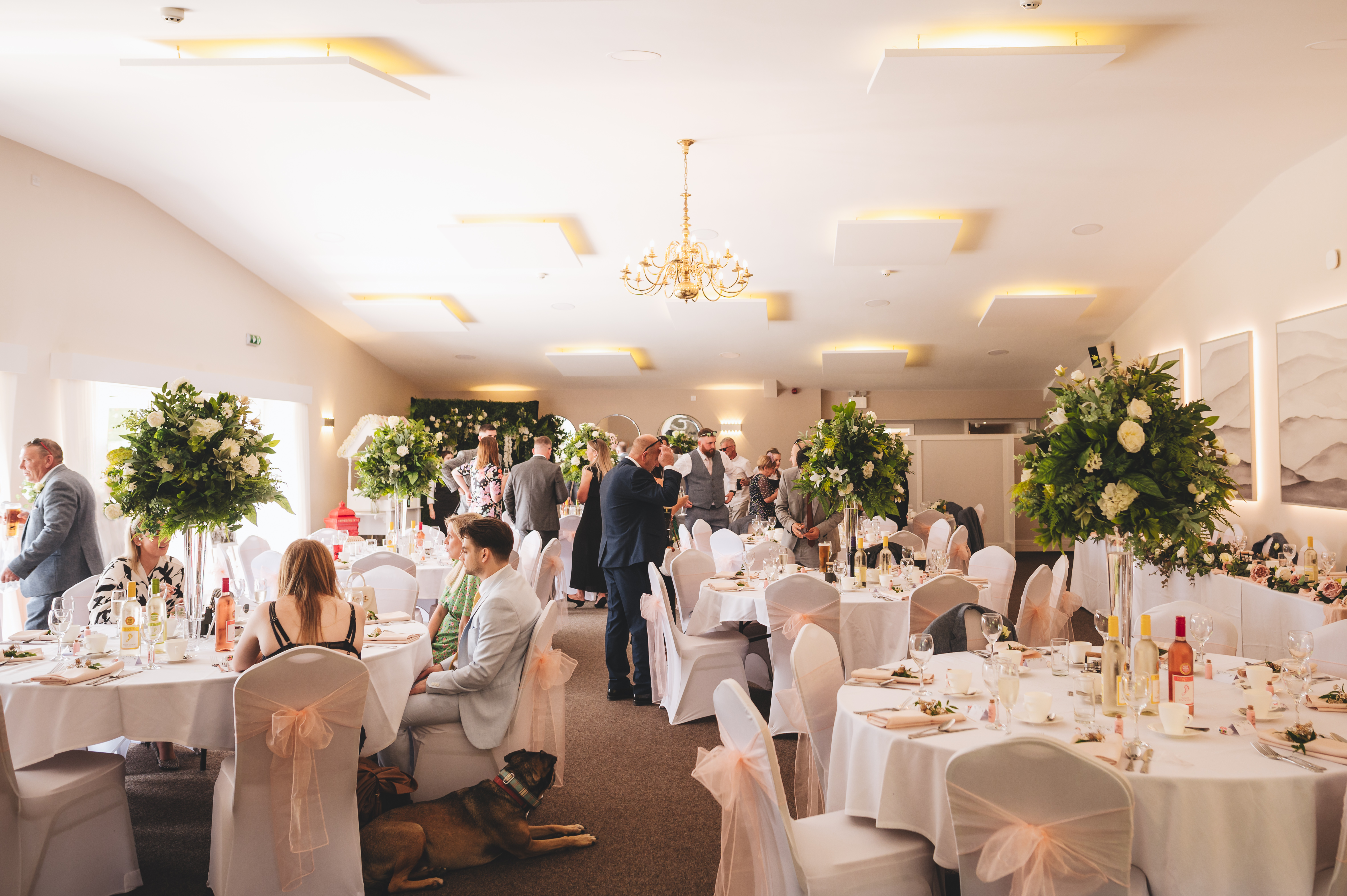 Eaton Manor Events Centre: elegant wedding venue with floral centerpieces and soft lighting.