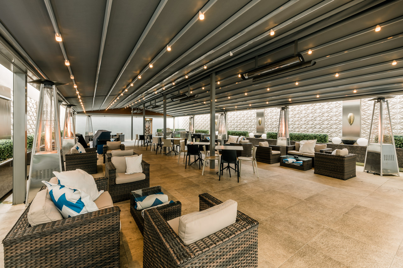 Outdoor event space at The Place Hotel with stylish seating for gatherings and meetings.