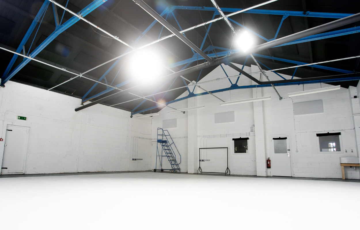 Spacious event space in Klatch Studio with high ceilings for meetings and workshops.