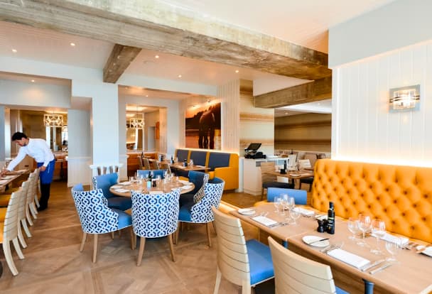 Modern booth seating in The Snug at Harbour Hotel Brighton, ideal for corporate lunches and events.