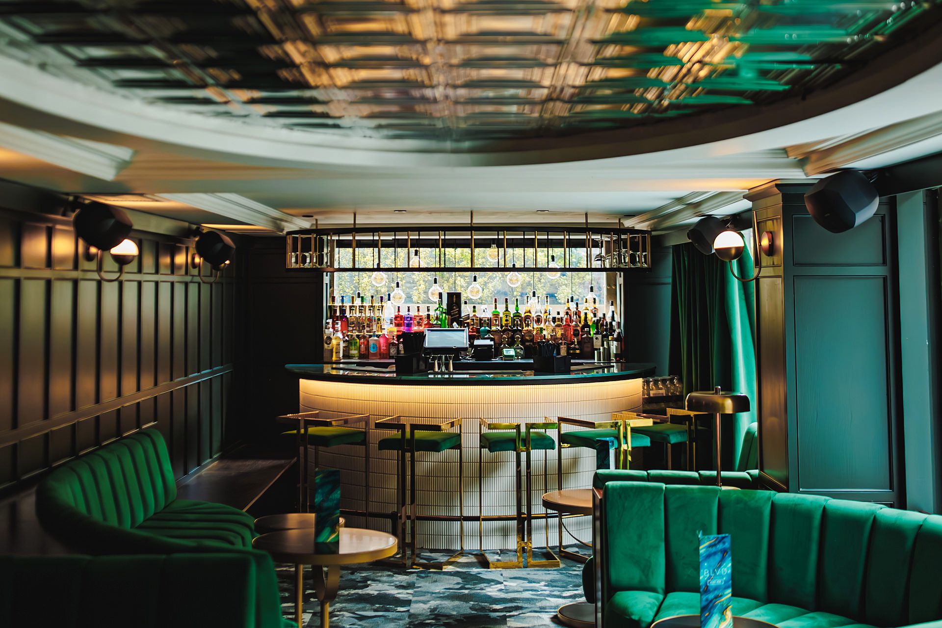 Stylish bar with plush seating at BLVD Spinningfields for cocktail receptions and networking.