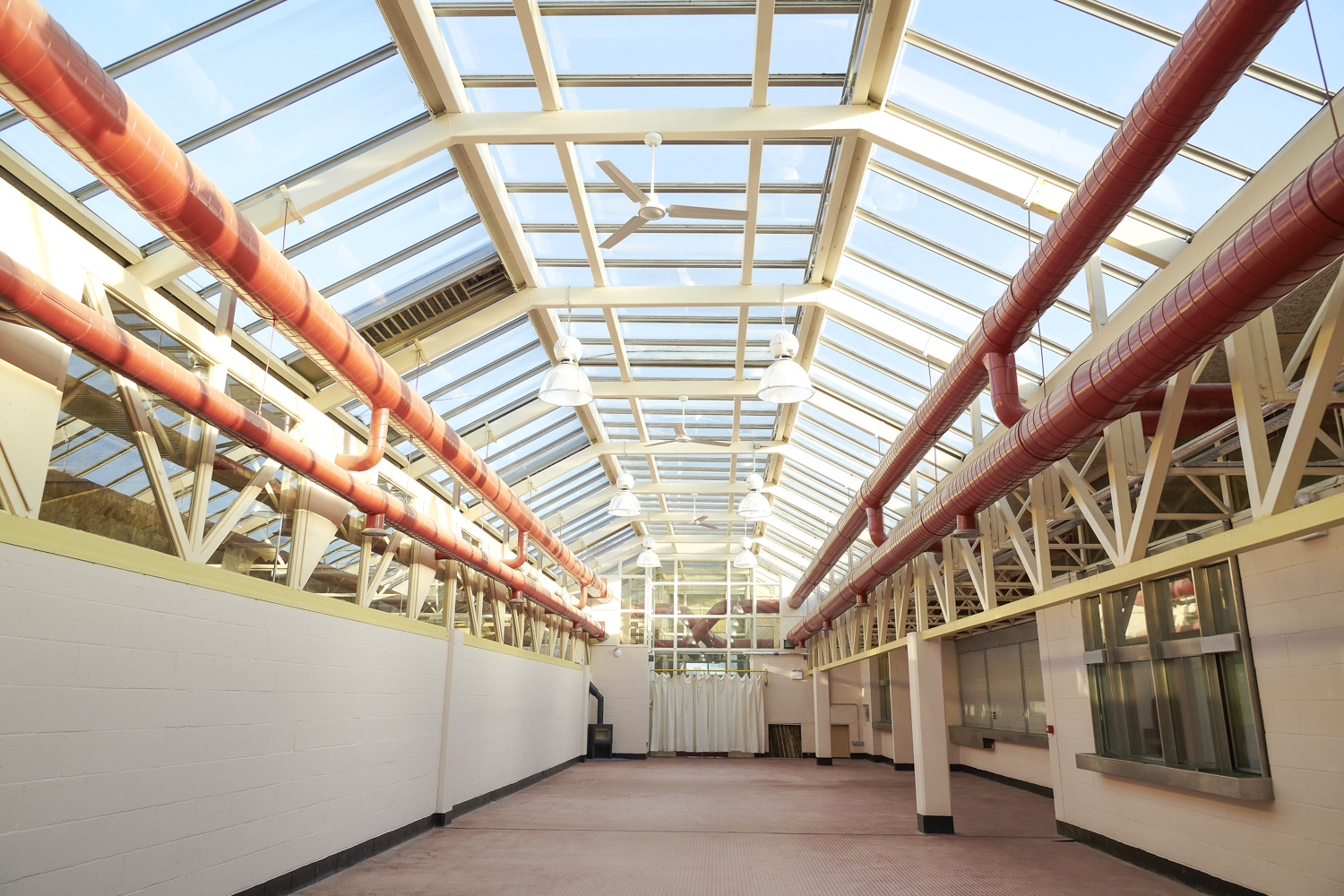 Hackney Depot Main Hall with glass ceiling, ideal for corporate and creative events.
