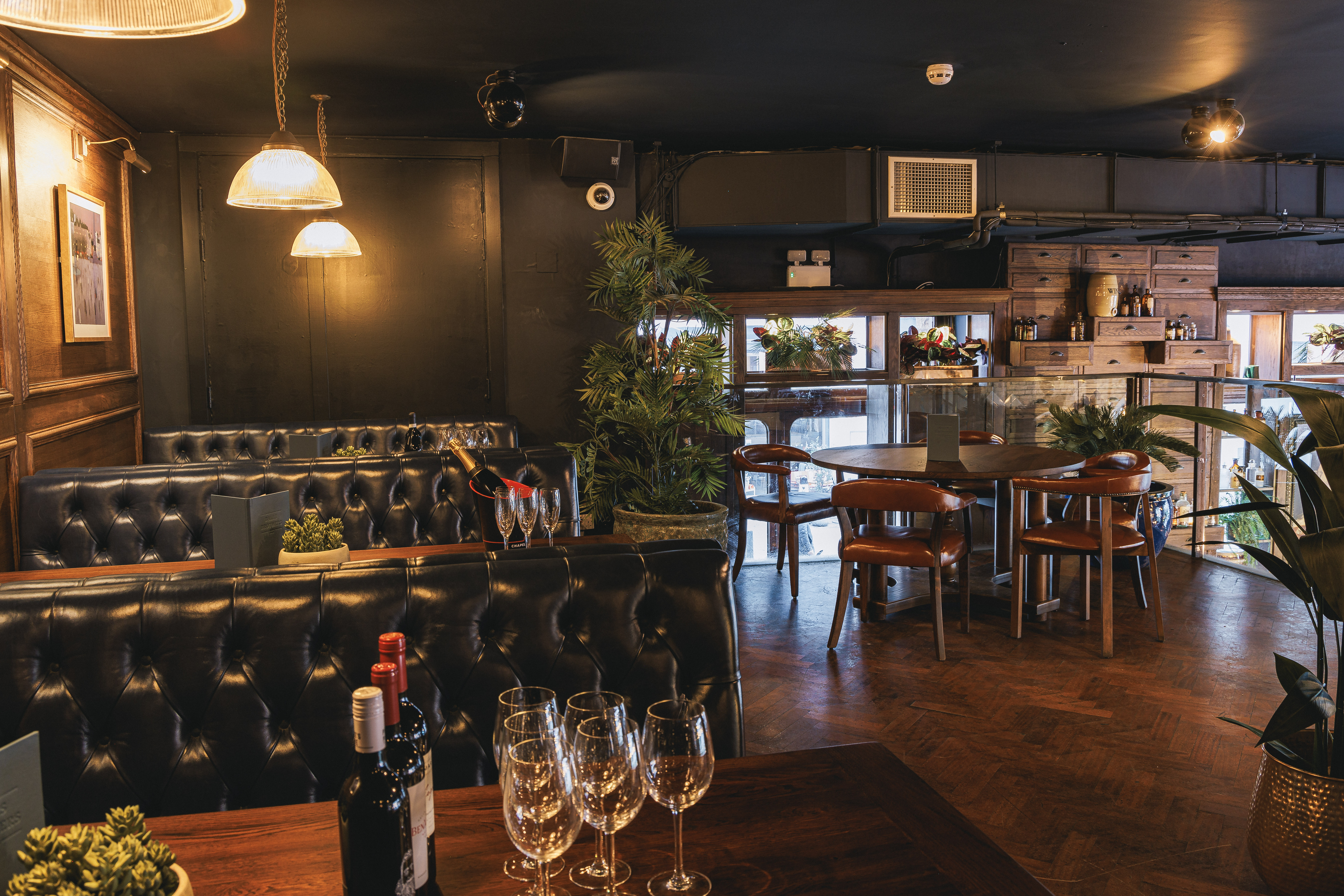 Intimate venue with dark wood accents for small meetings and private events.