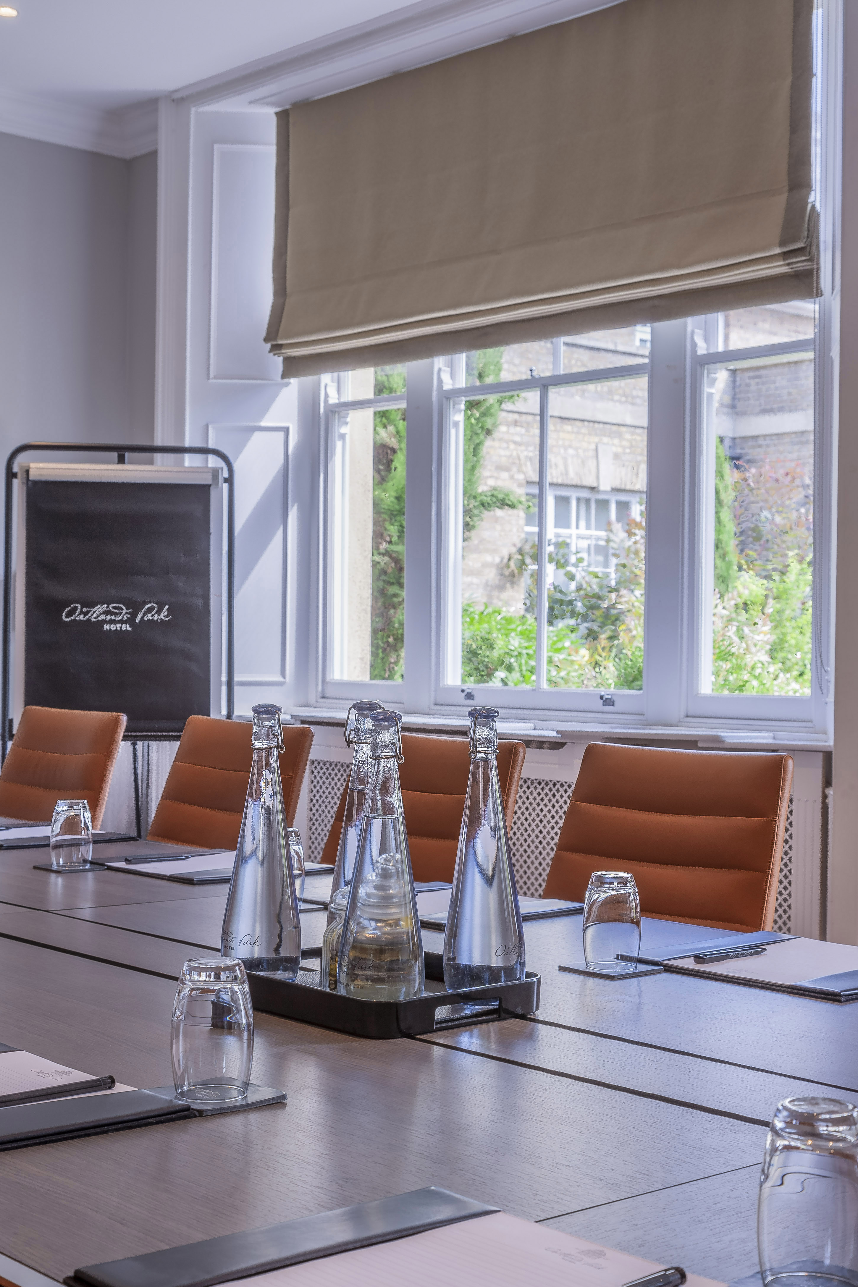 Surrey Room at Oatlands Park Hotel, bright meeting space with modern seating for events.