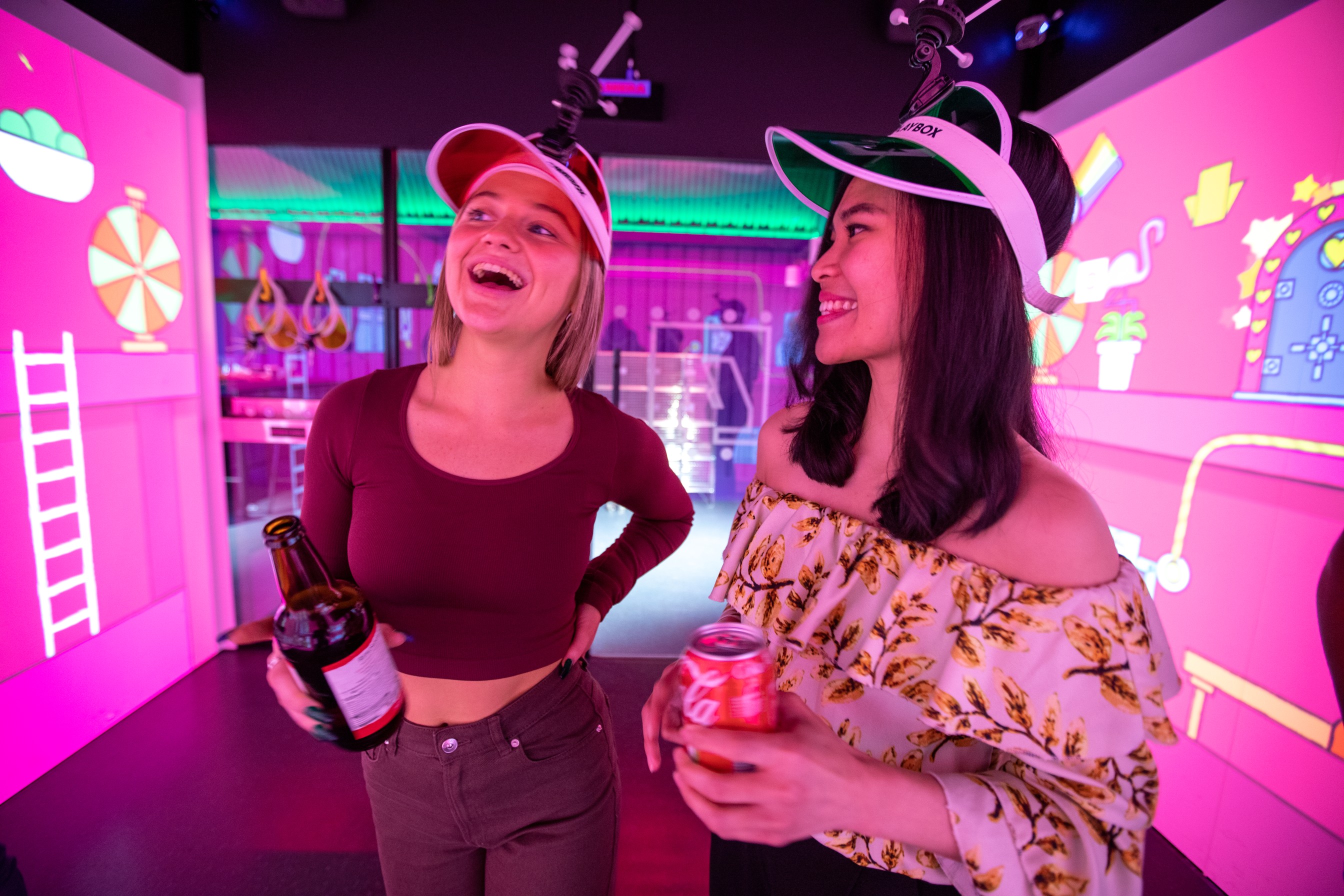 Electric Gamebox Manchester event space with colorful backdrop for team-building activities.