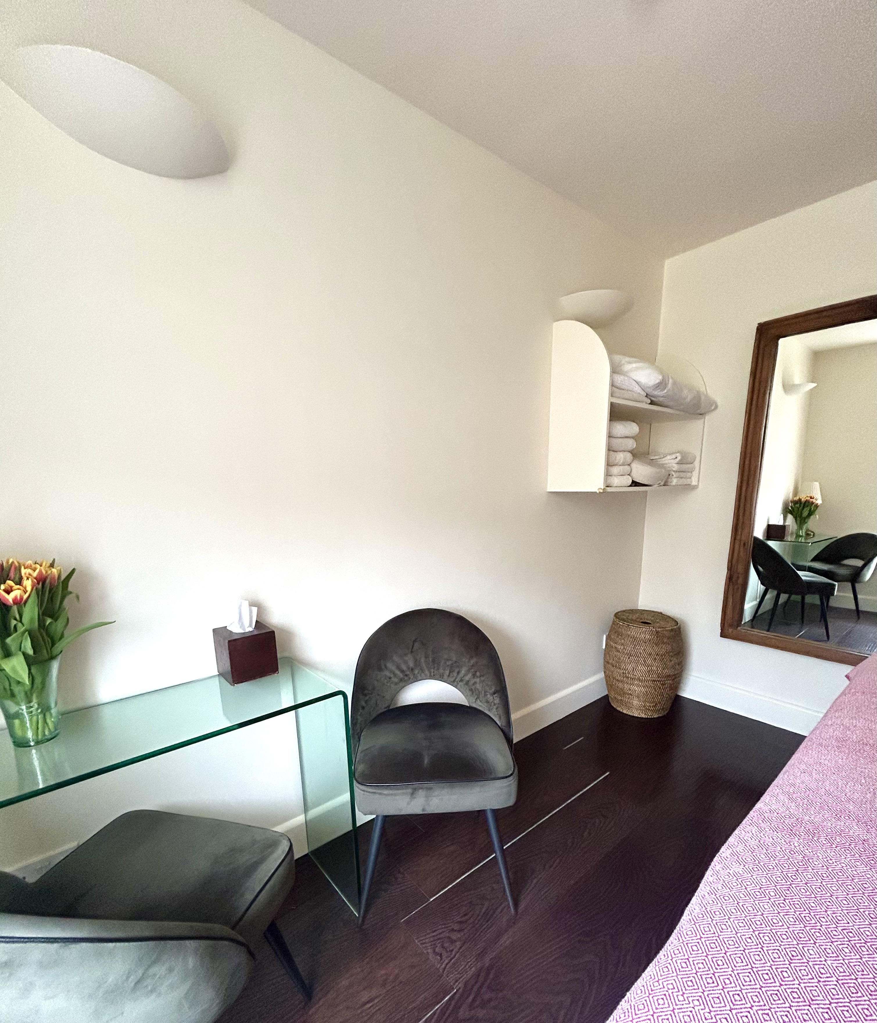 Serene treatment room with minimalist design for wellness and breakout sessions.