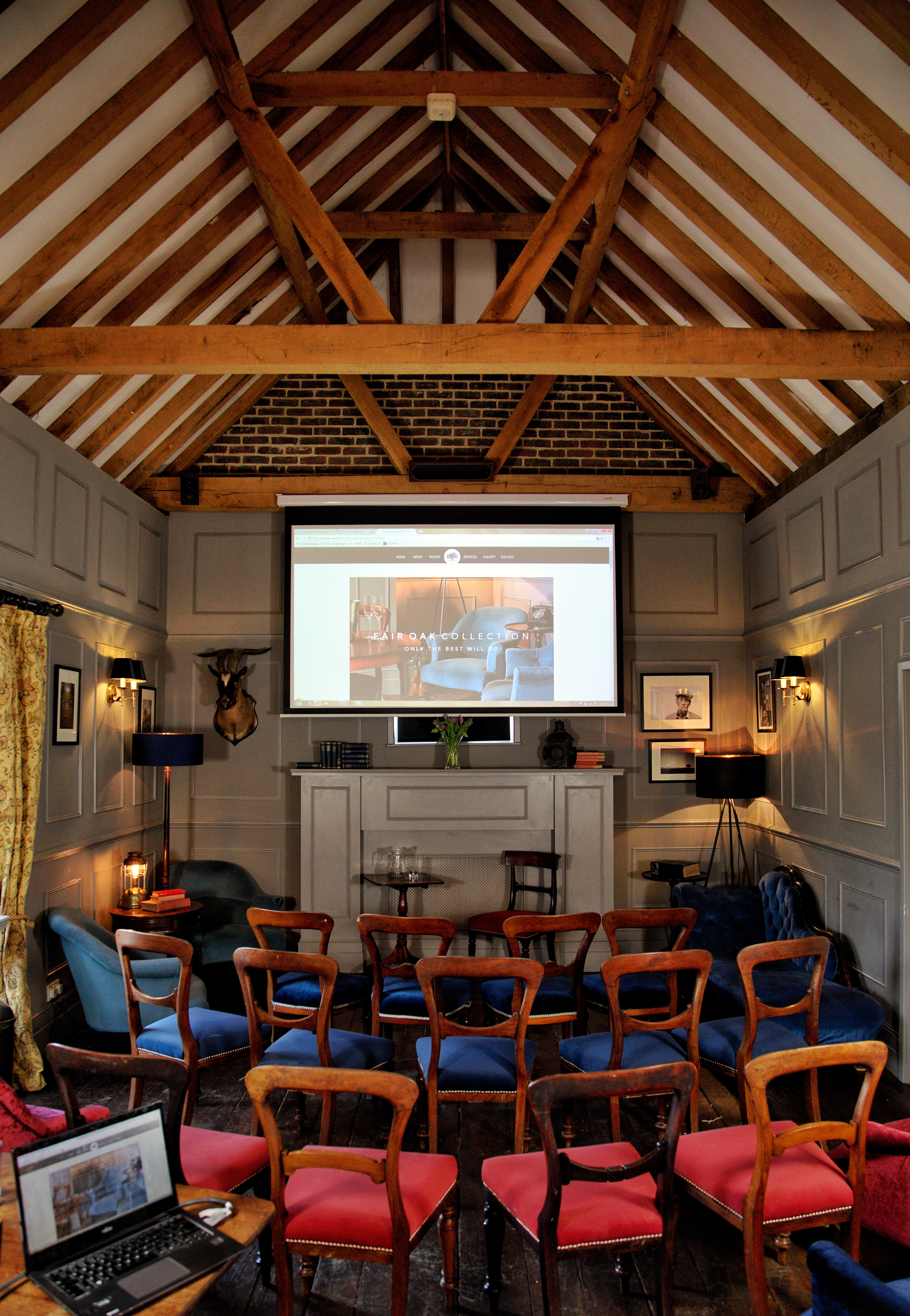 Stylish meeting space with cozy decor for private retreats and events at Fair Oak Farm.