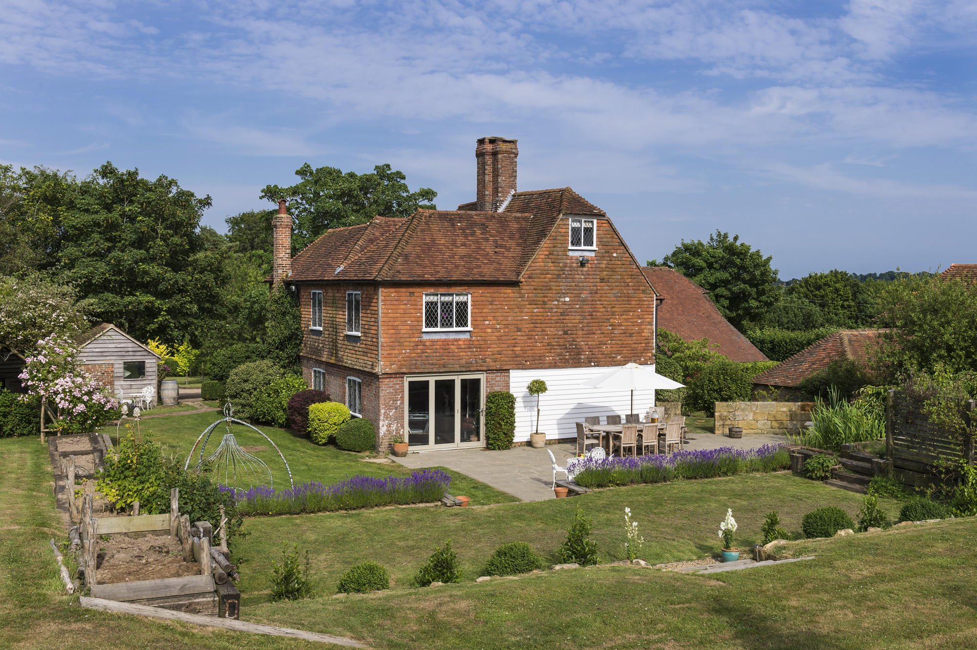 Charming countryside venue with rustic architecture for weddings and retreats.