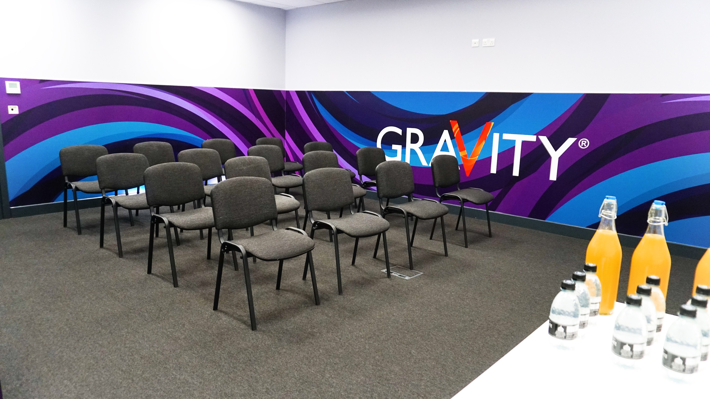 Calculus Suite meeting space with vibrant branding for engaging workshops in Wandsworth.