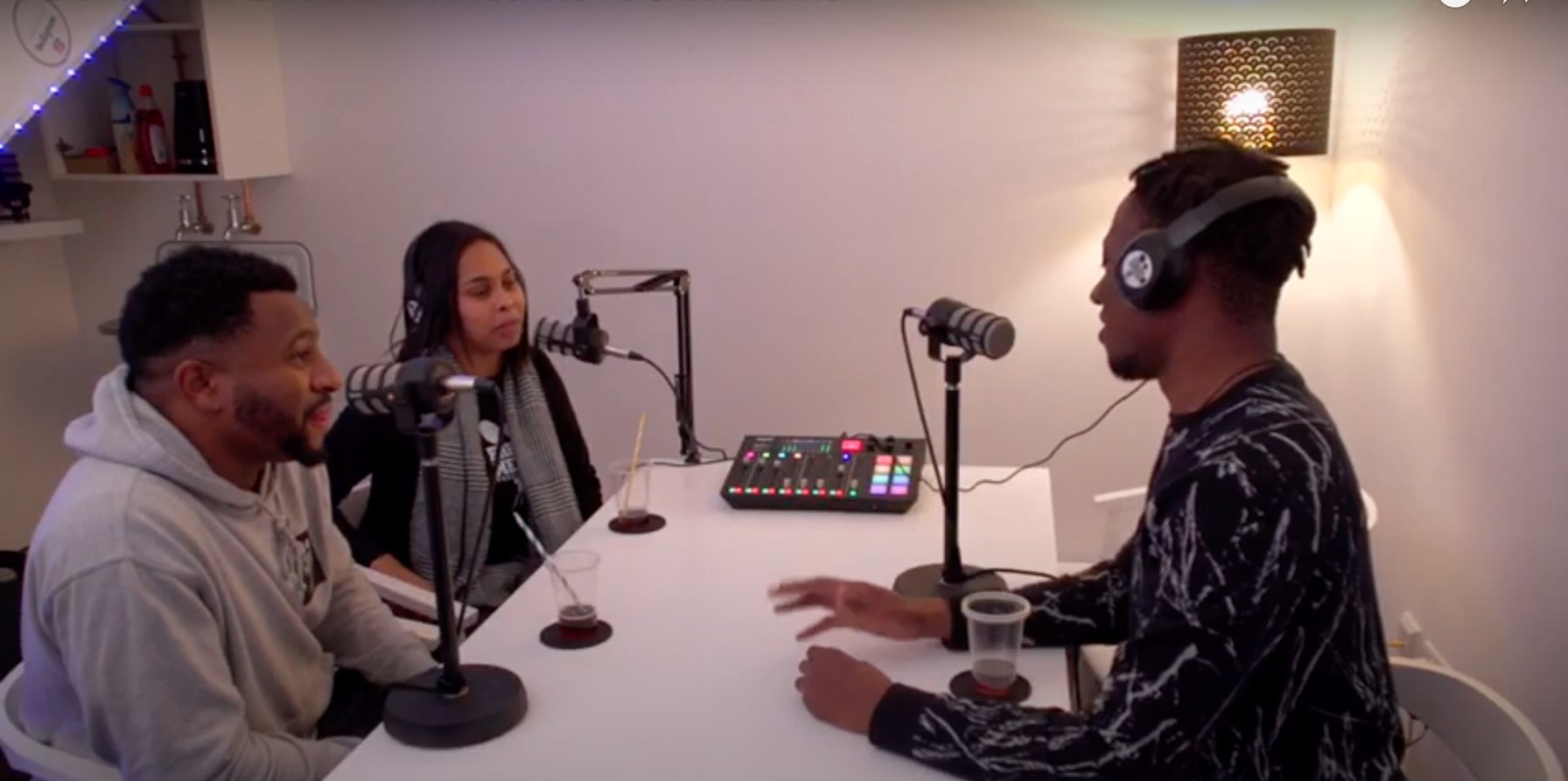 Podcast recording setup in a creative studio, fostering engaging discussions and collaboration.