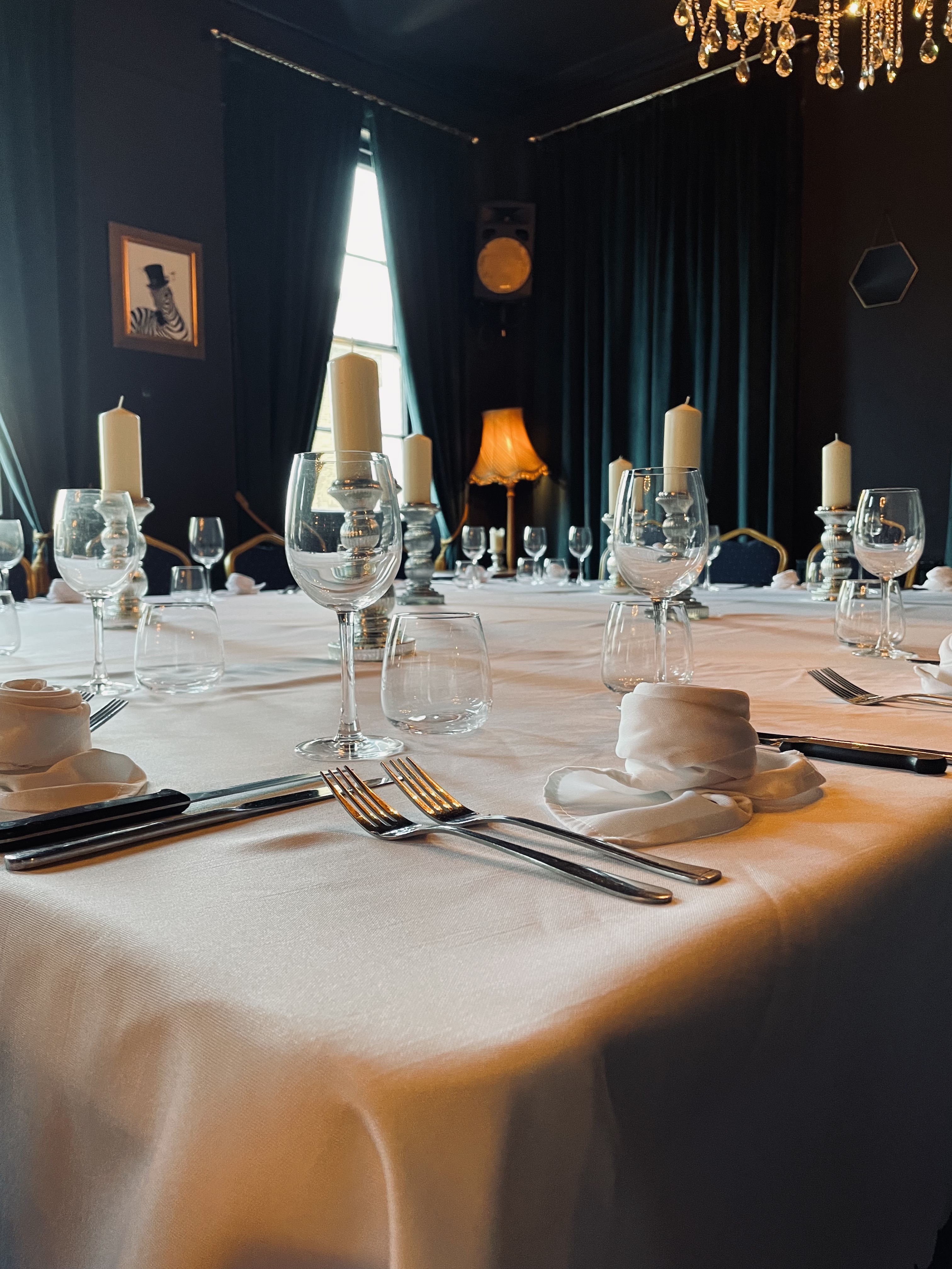 Elegant dining table setup at The Imperial Arms Lounge for formal events.