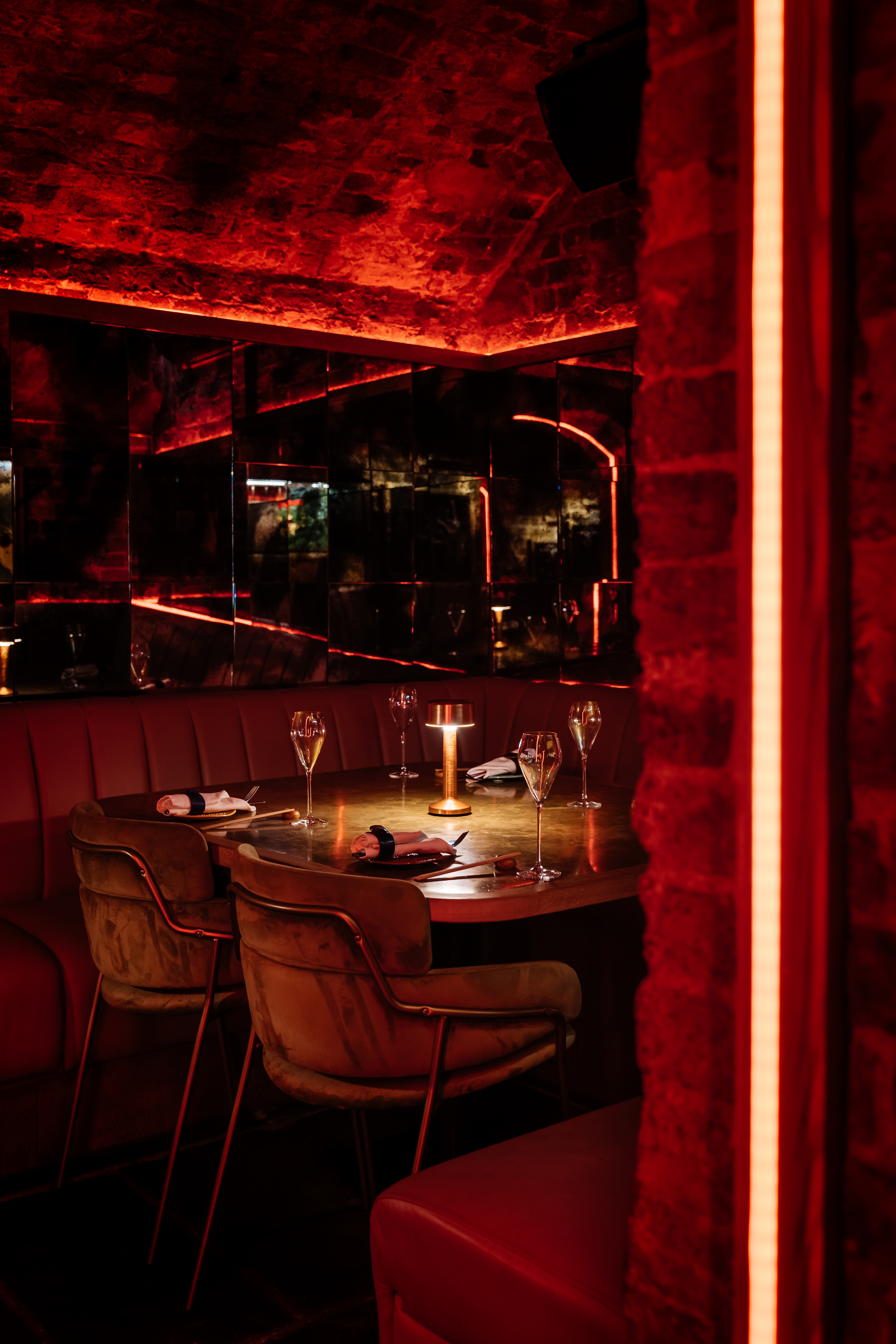 Sophisticated dining setup with elegant table for exclusive meetings and events.