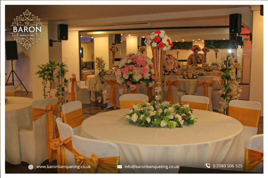 Elegant banquet hall with gold accents, ideal for weddings and formal events.