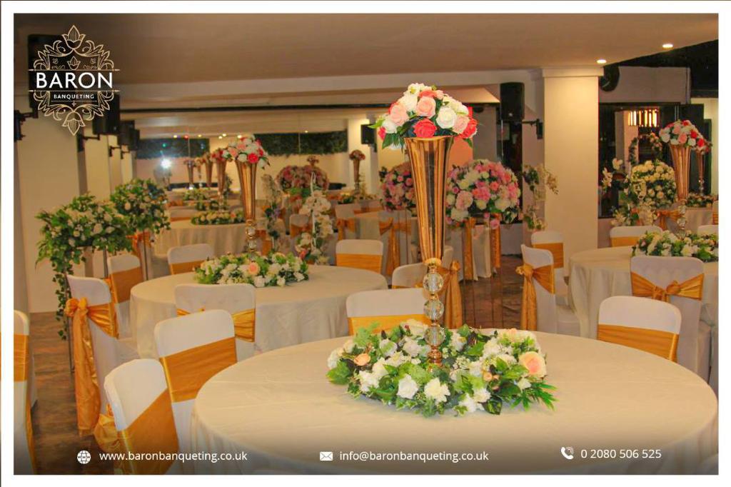 Elegant banquet hall with floral centerpieces for weddings and corporate events.