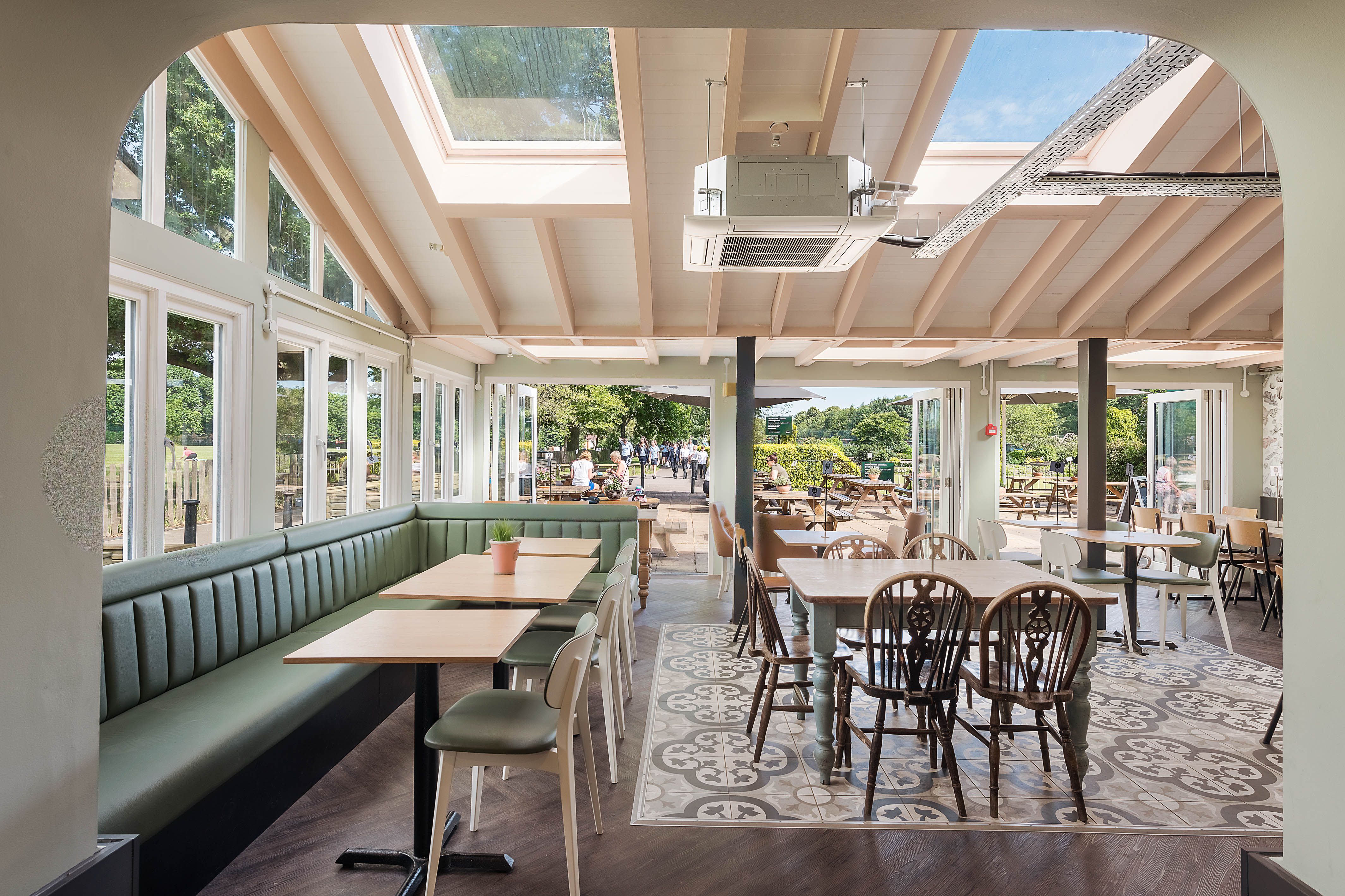 Bright event space at The Skylark Cafe with large windows, perfect for gatherings.