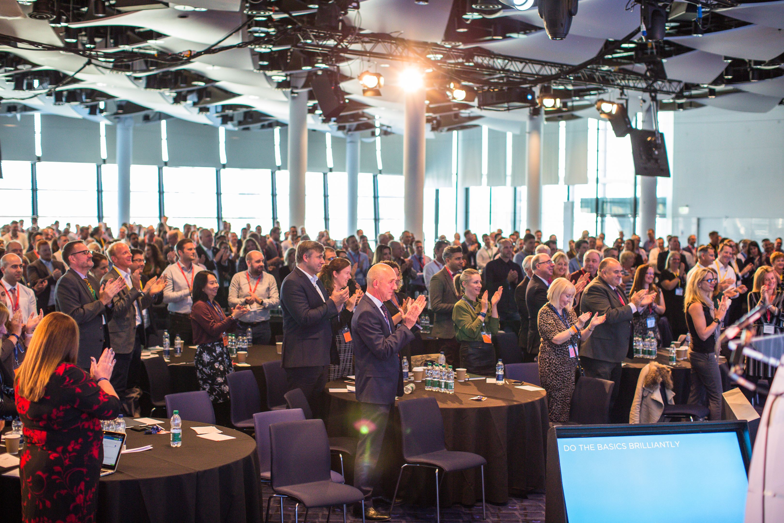 Great Hall Wembley Stadium audience standing ovation keynote presentation networking event