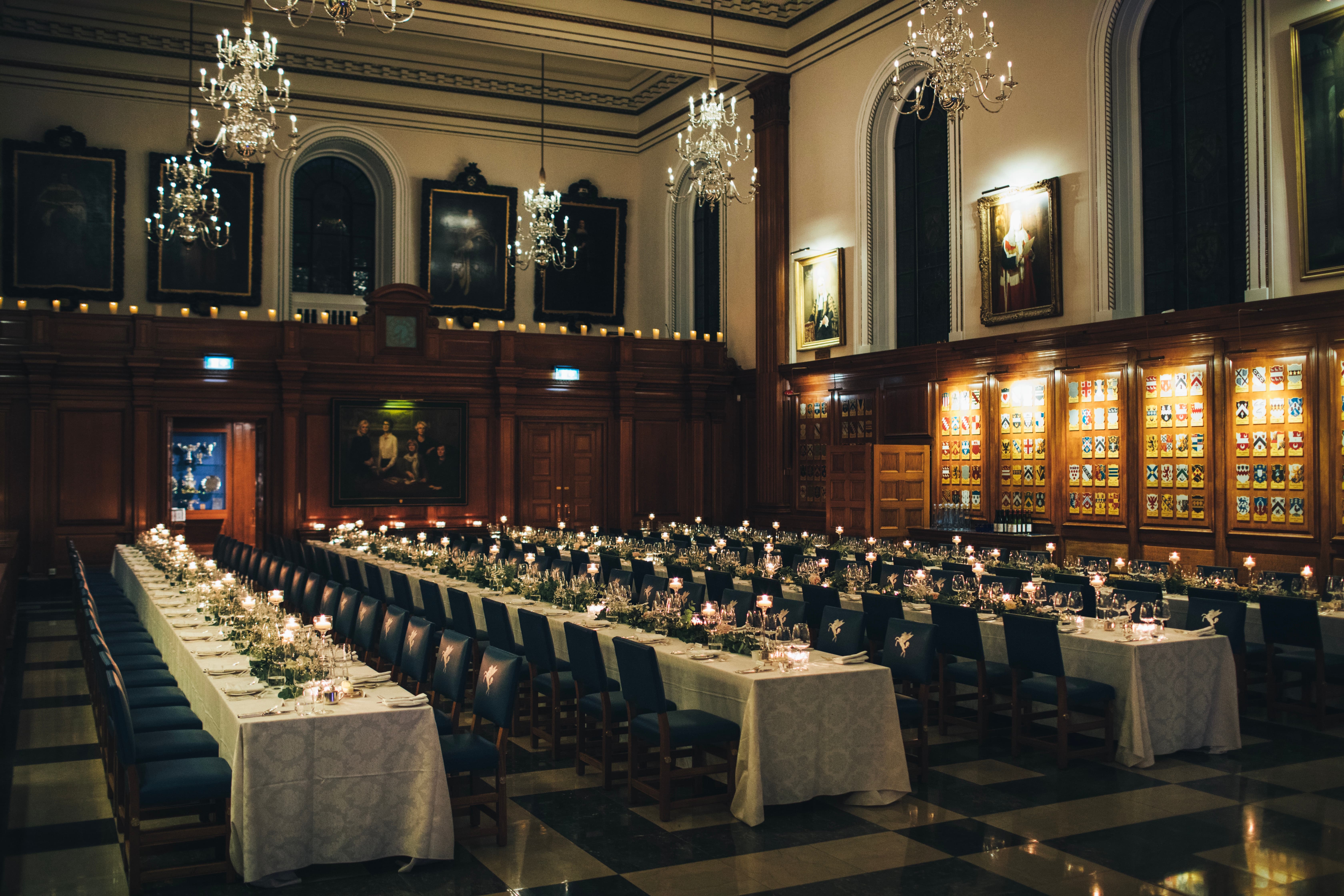 Formal banquet setup in historic Inner Temple Hall, London, for luxury event venue hire.