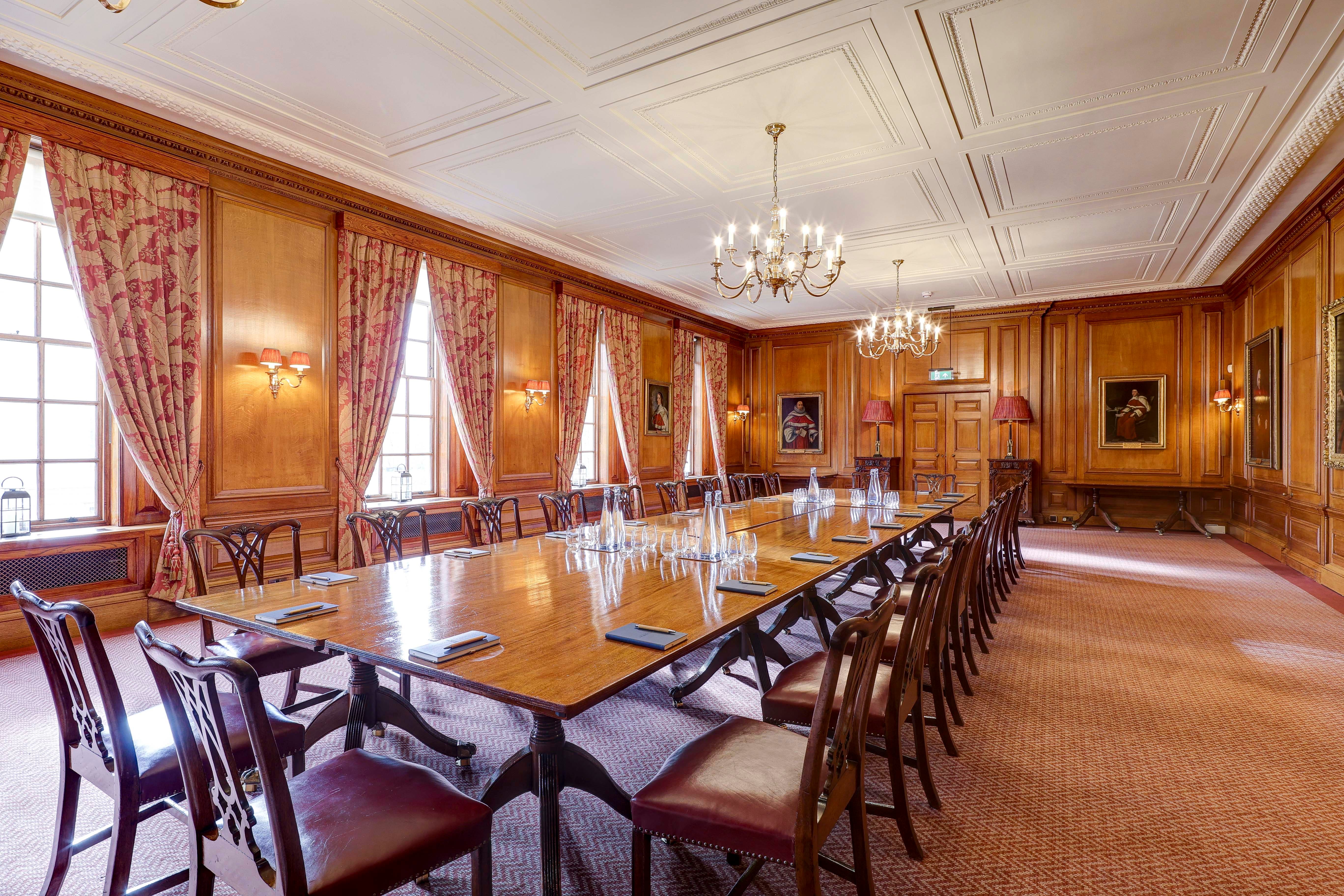 Parliament Chamber with wood paneling for executive meetings and private dinners.