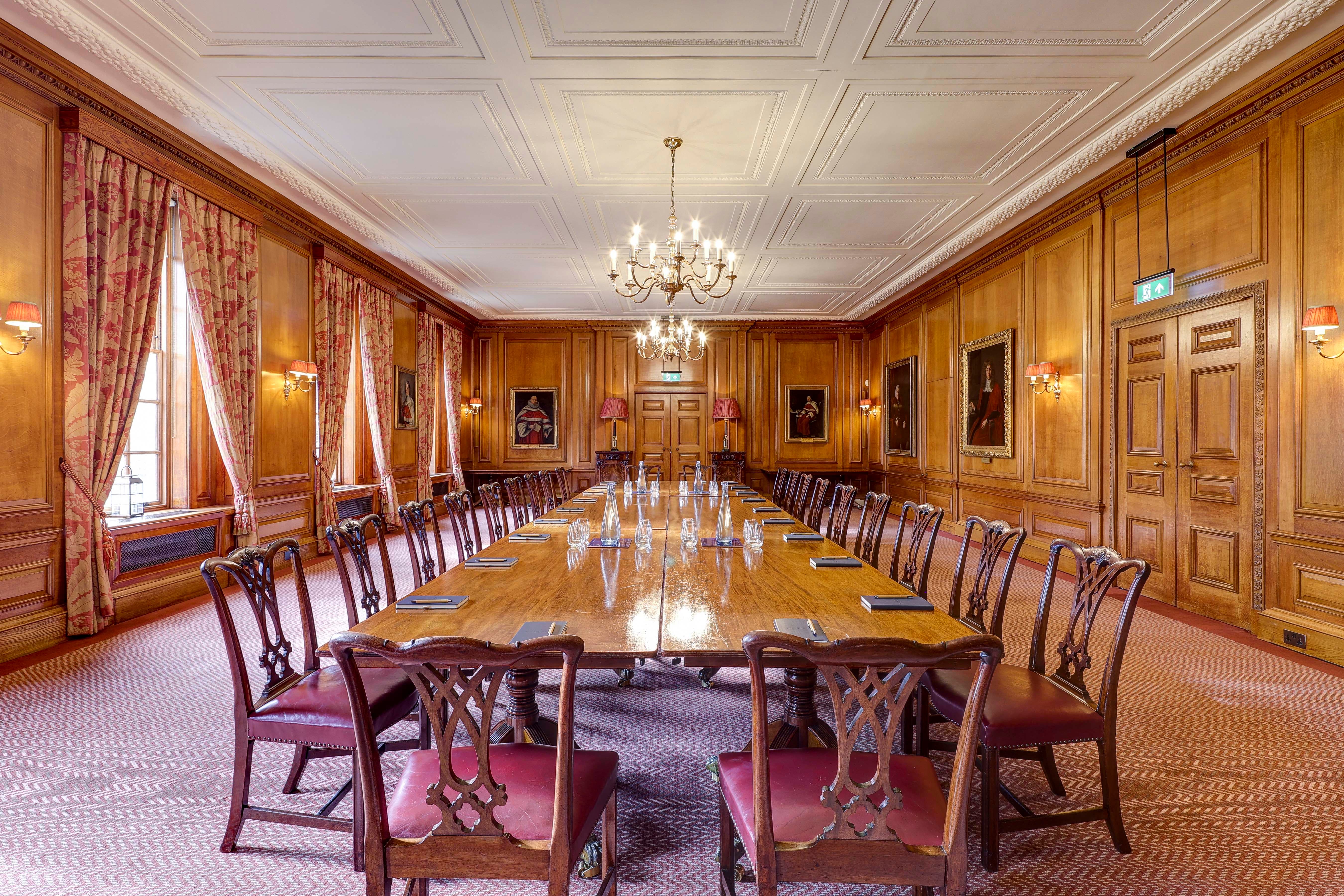 Parliament Chamber boardroom for executive meetings and private dining in historic wood-paneled room.