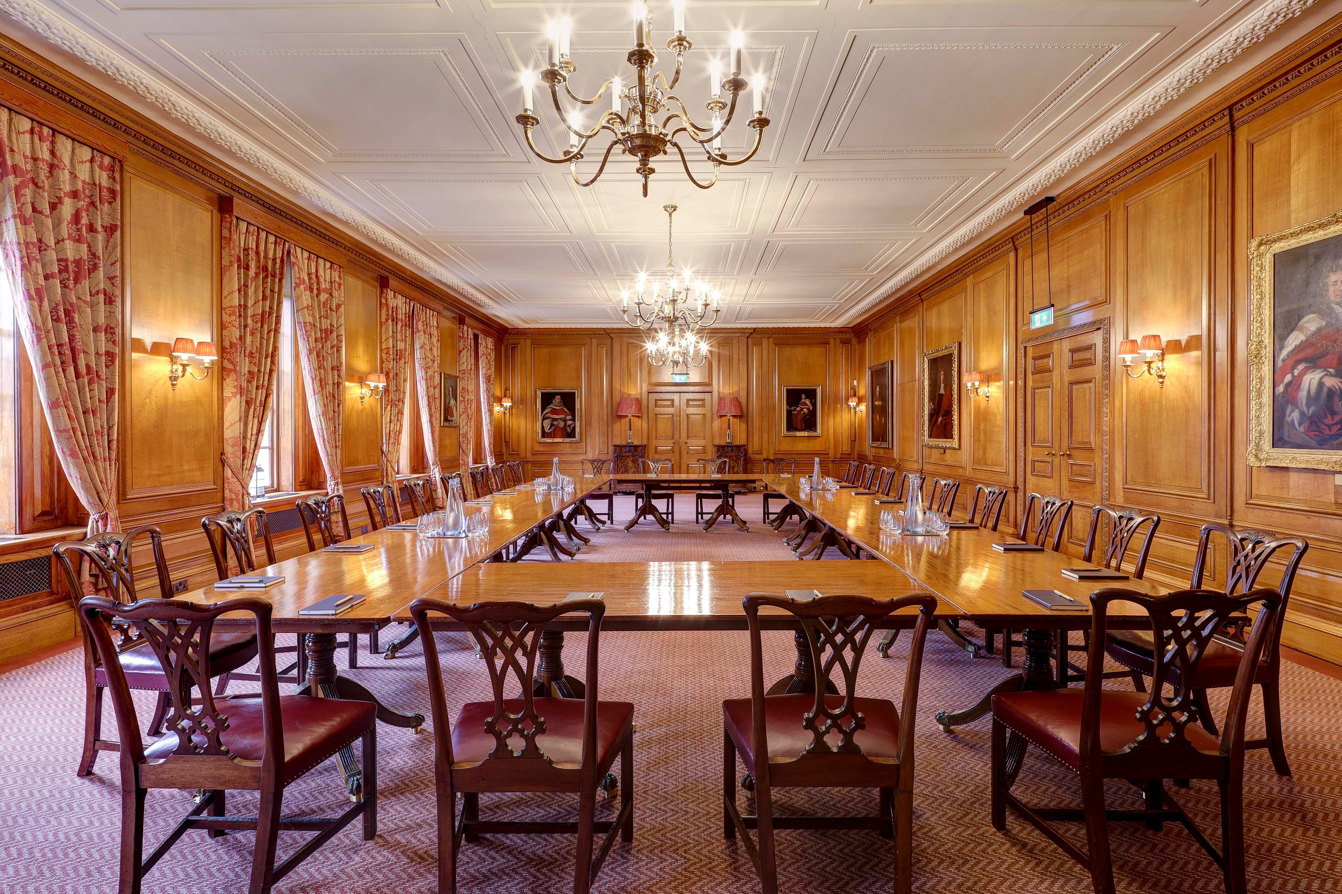 Parliament Chamber boardroom with wood paneling for formal meetings and corporate events.