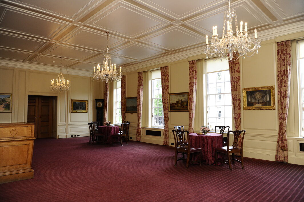 Elegant Luncheon Room with chandeliers, ideal for networking events and receptions.
