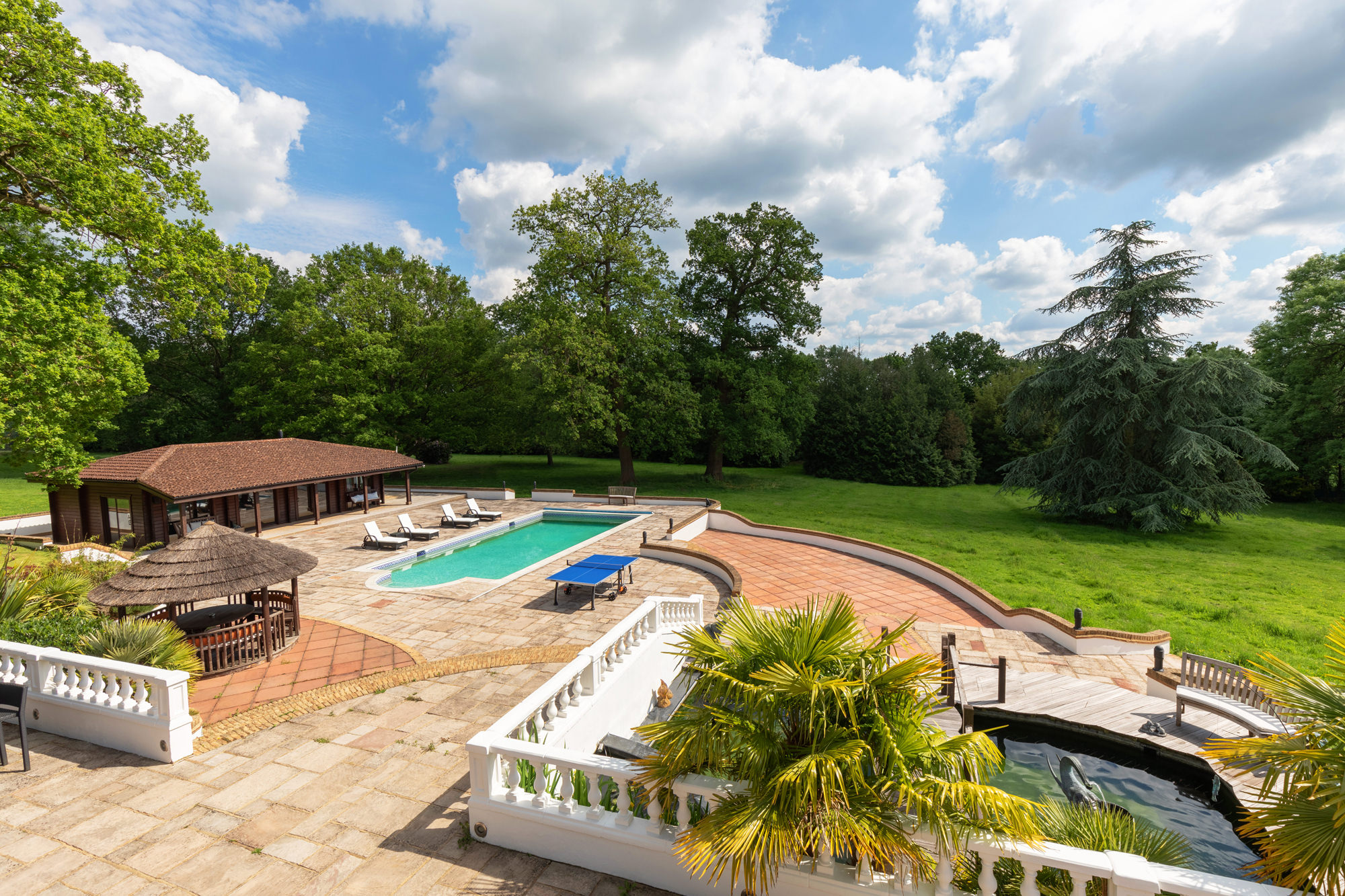 Villa Mansion outdoor venue with pool, ideal for corporate retreats and social events.