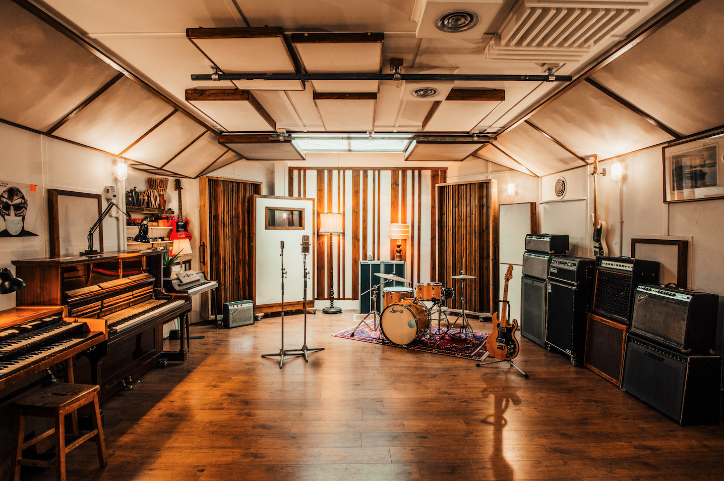 Recording studio in Lightship 95 with warm lighting, ideal for creative events and workshops.