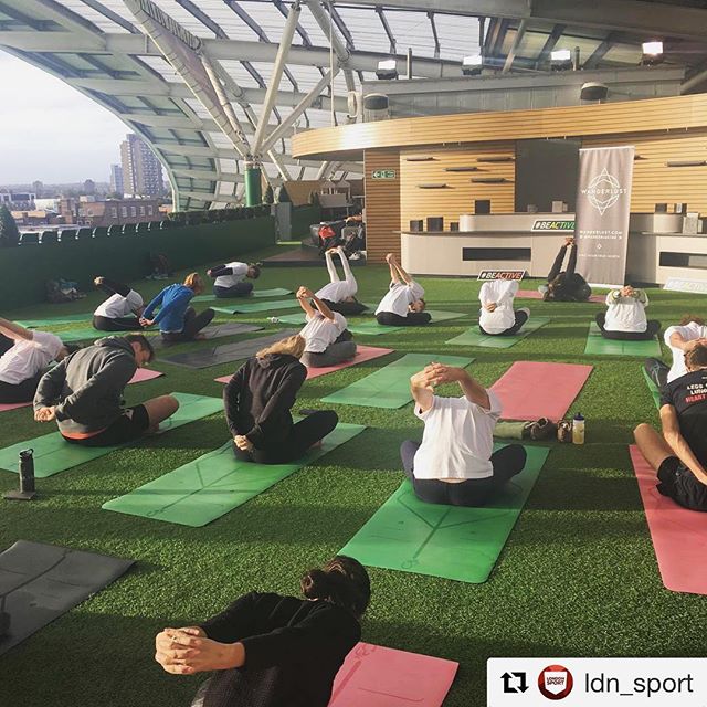 Corinthian Roof Terrace yoga event with green turf, ideal for wellness retreats.