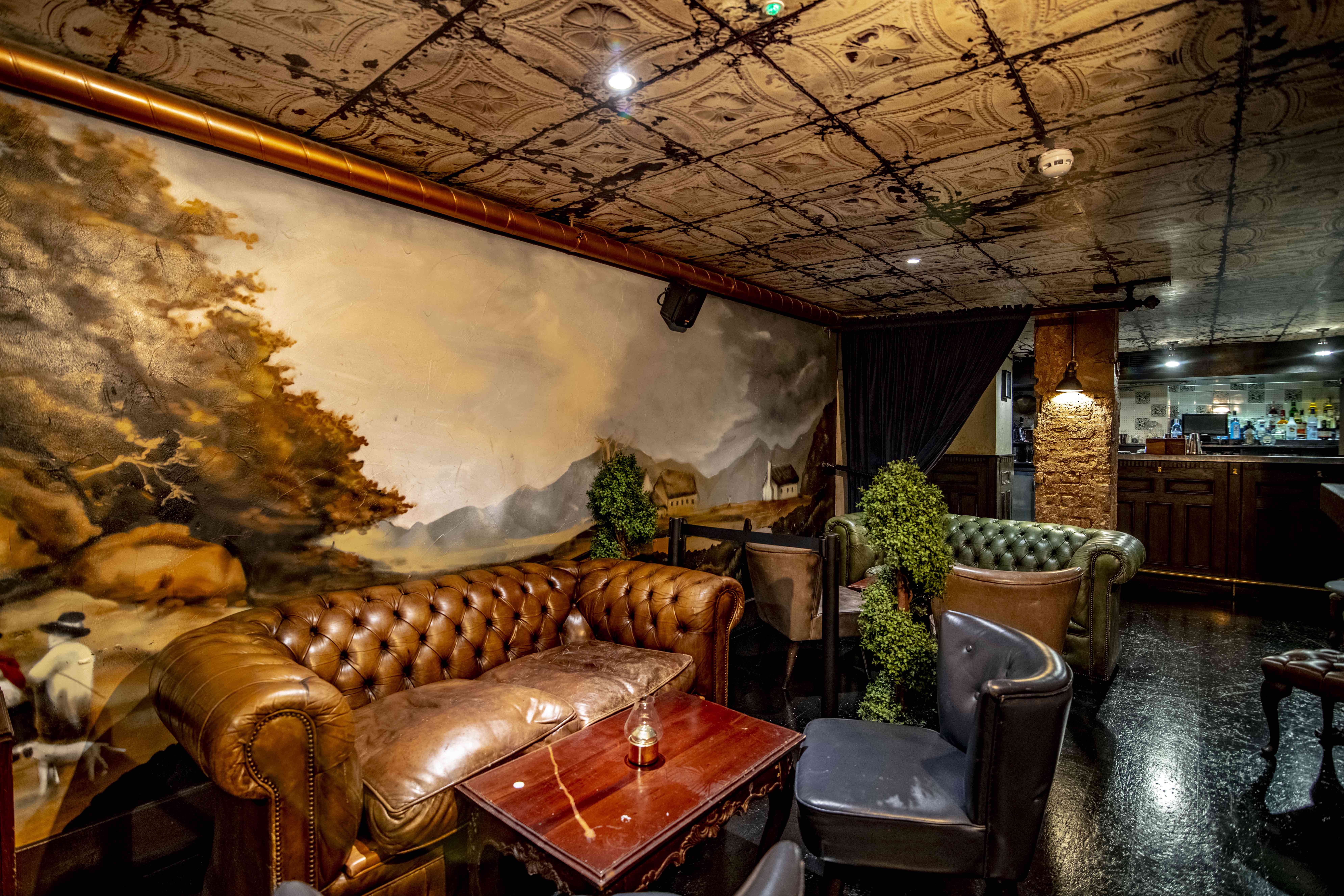 Sophisticated lounge with leather seating for intimate meetings at The Goat Chelsea.
