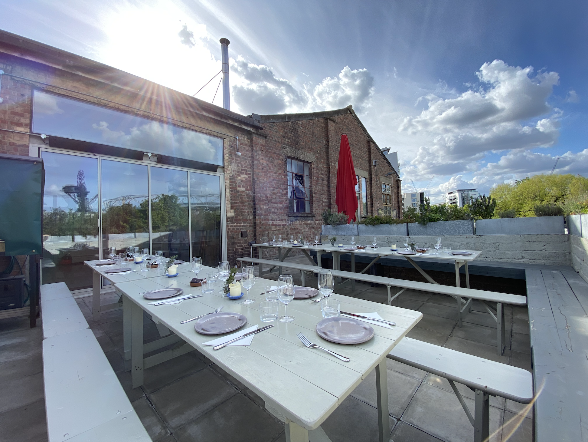Stylish outdoor dining setup for corporate retreats at Autumn Yard Events Space.