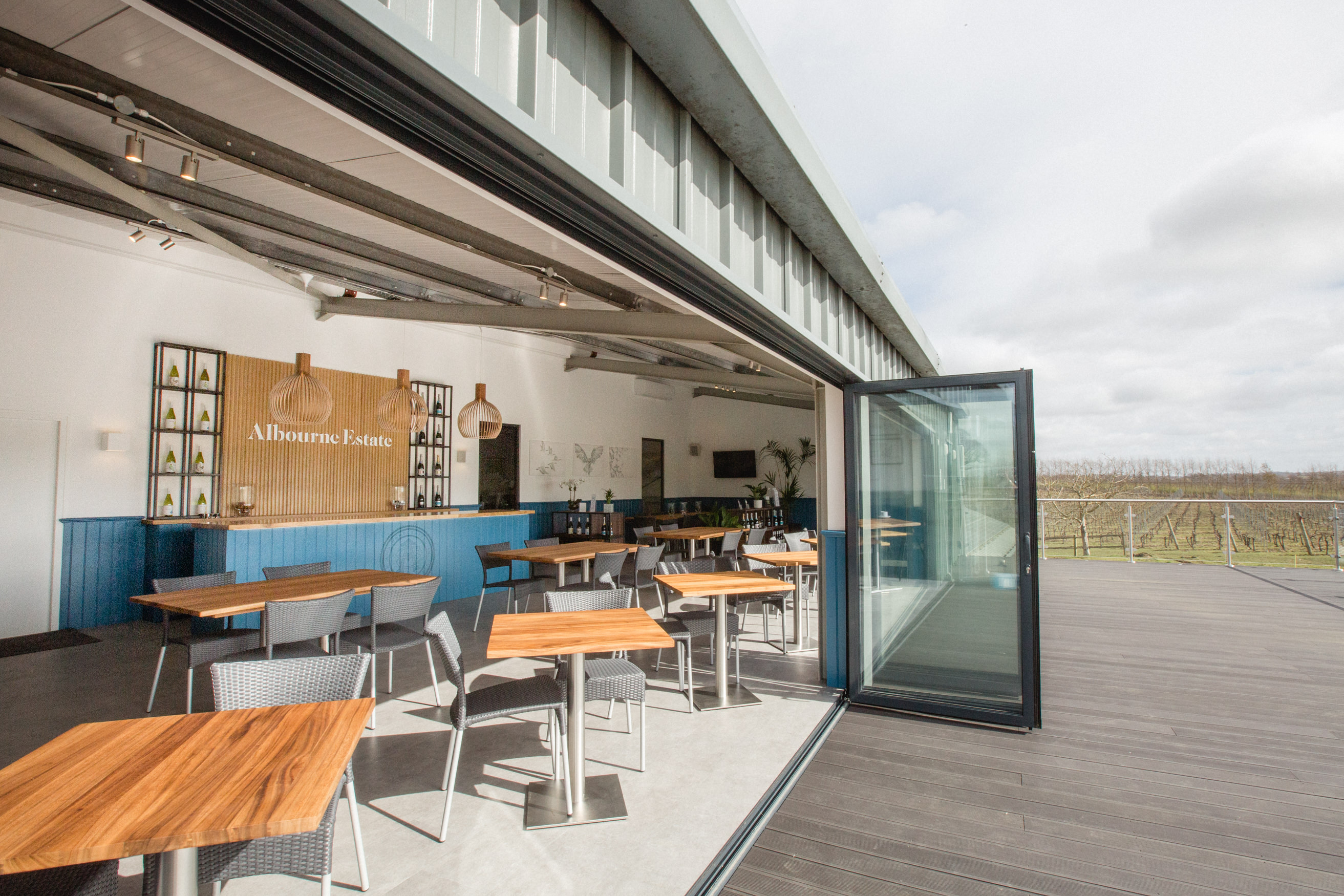 Modern event space at Albourne Estate with natural light, ideal for gatherings and receptions.